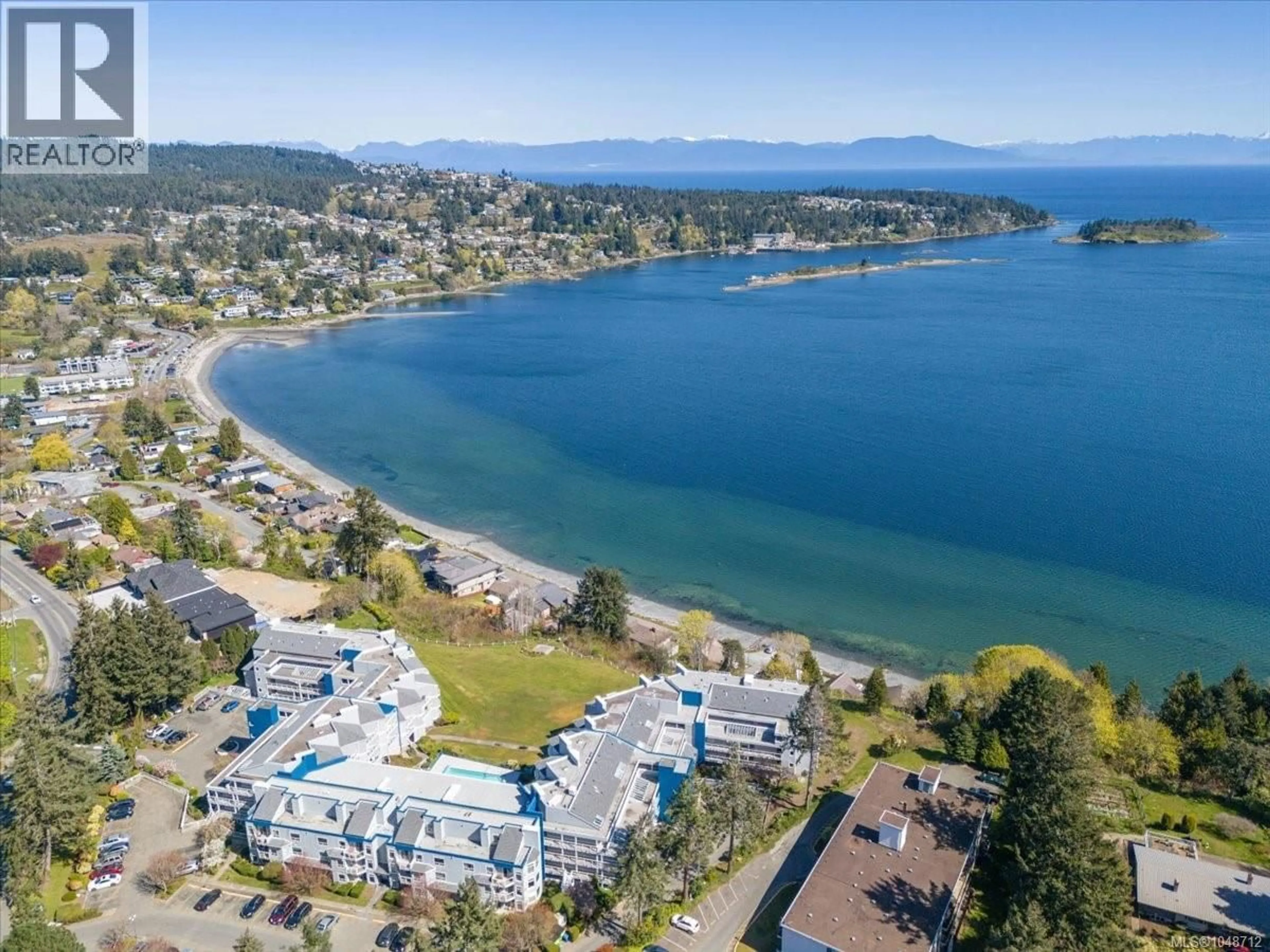 A pic from outside/outdoor area/front of a property/back of a property/a pic from drone, water/lake/river/ocean view for 108 - 2562 DEPARTURE BAY ROAD, Nanaimo British Columbia V9S5P1