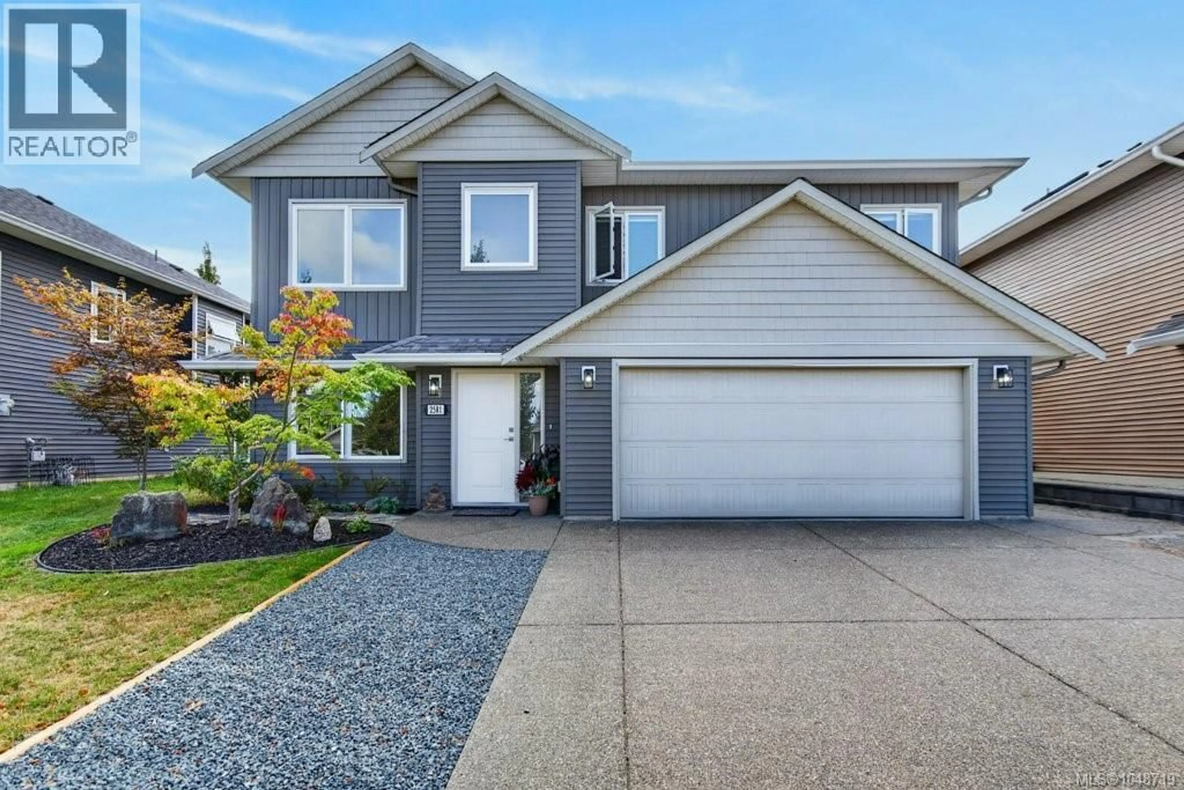 Home with vinyl exterior material, street for 2581 KENDAL AVENUE, Cumberland British Columbia V0R1S0