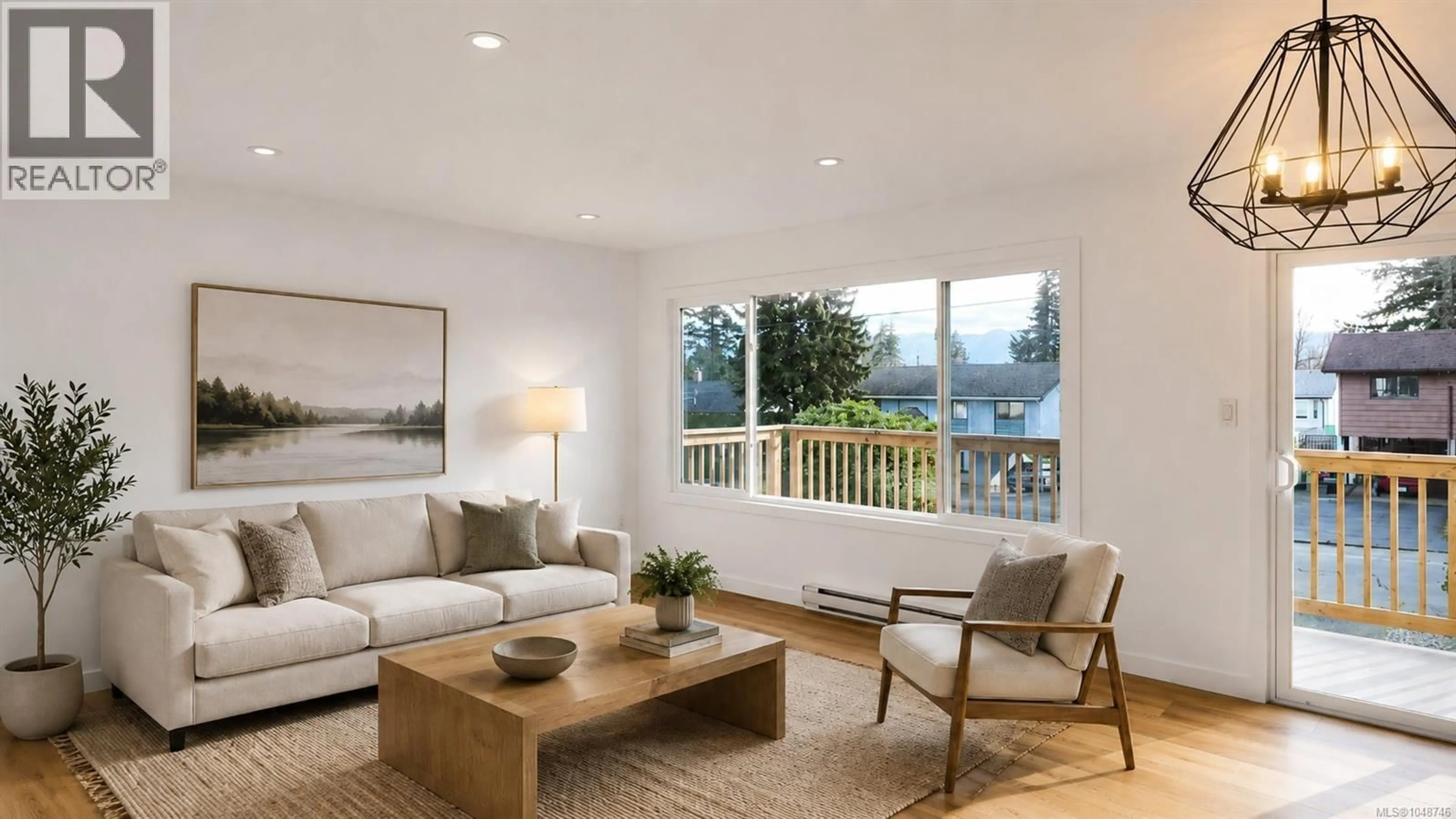 Living room with furniture, wood/laminate floor for 4644 MACINTYRE AVENUE, Courtenay British Columbia V9N6R2
