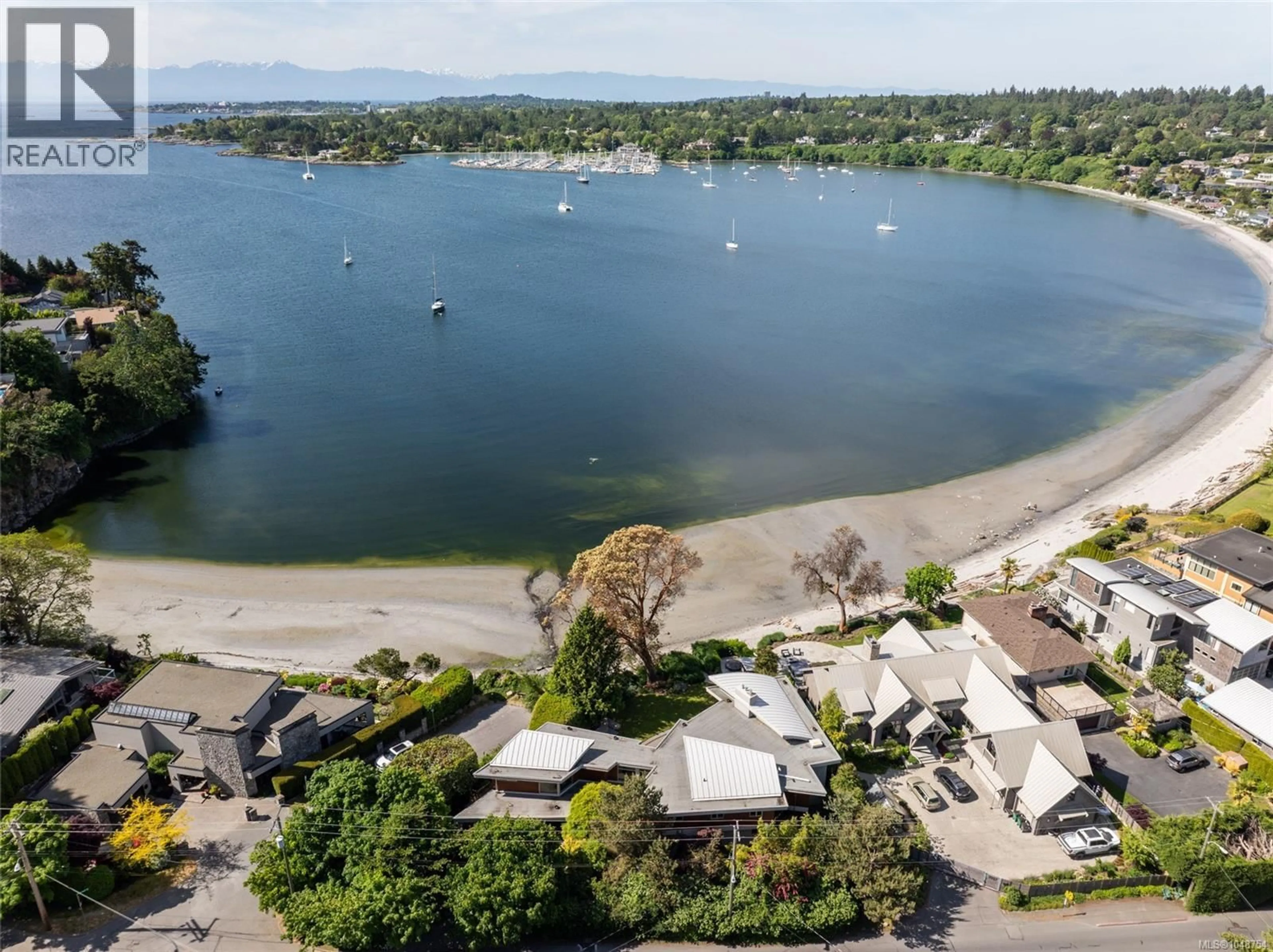 A pic from outside/outdoor area/front of a property/back of a property/a pic from drone, water/lake/river/ocean view for 3931 CADBORO BAY ROAD, Saanich British Columbia V8N4G7