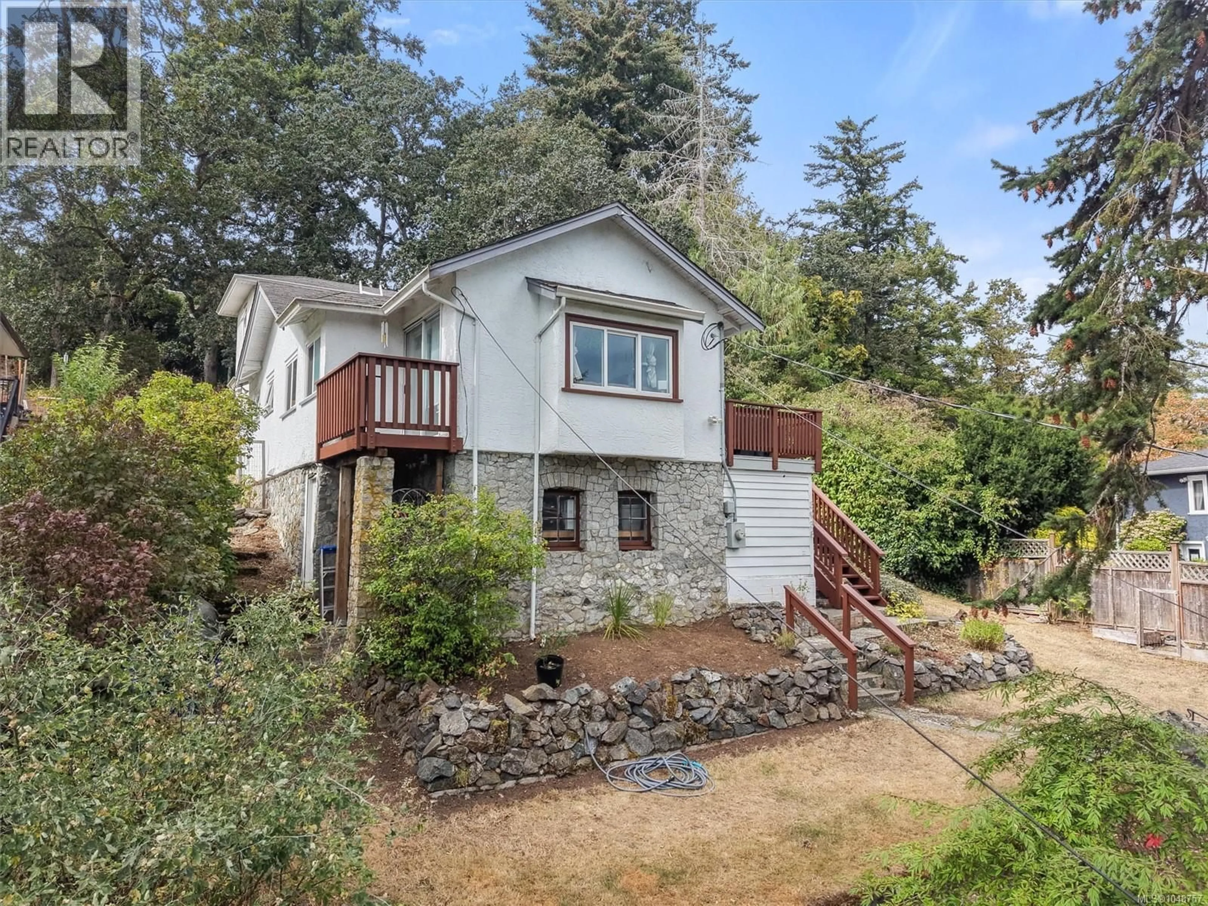 A pic from outside/outdoor area/front of a property/back of a property/a pic from drone, unknown for 3938 WILKINSON ROAD, Saanich British Columbia V8Z5A2