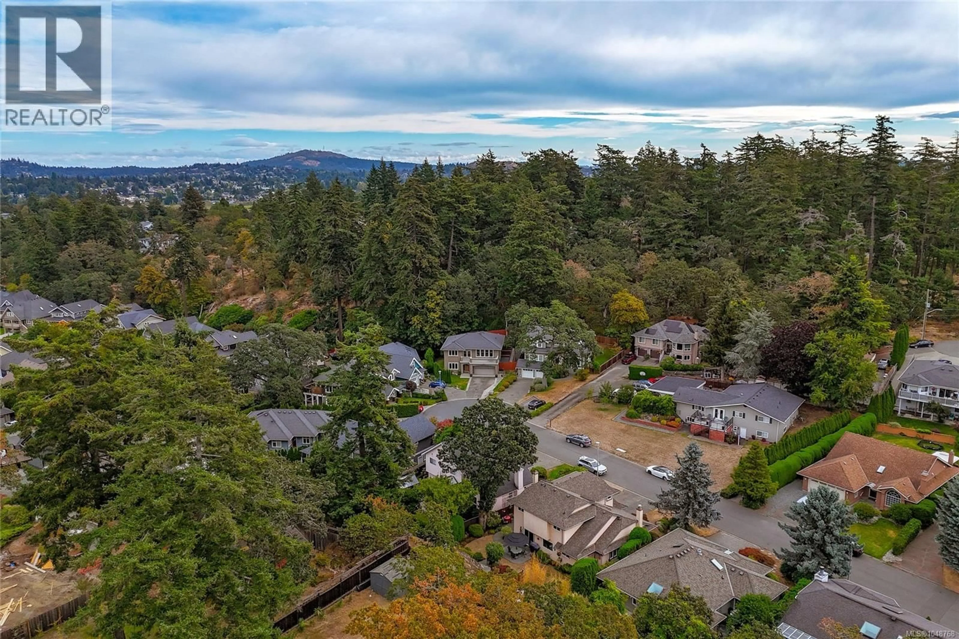 A pic from outside/outdoor area/front of a property/back of a property/a pic from drone, unknown for 3847 CARDIE COURT, Saanich British Columbia V8Z7G8