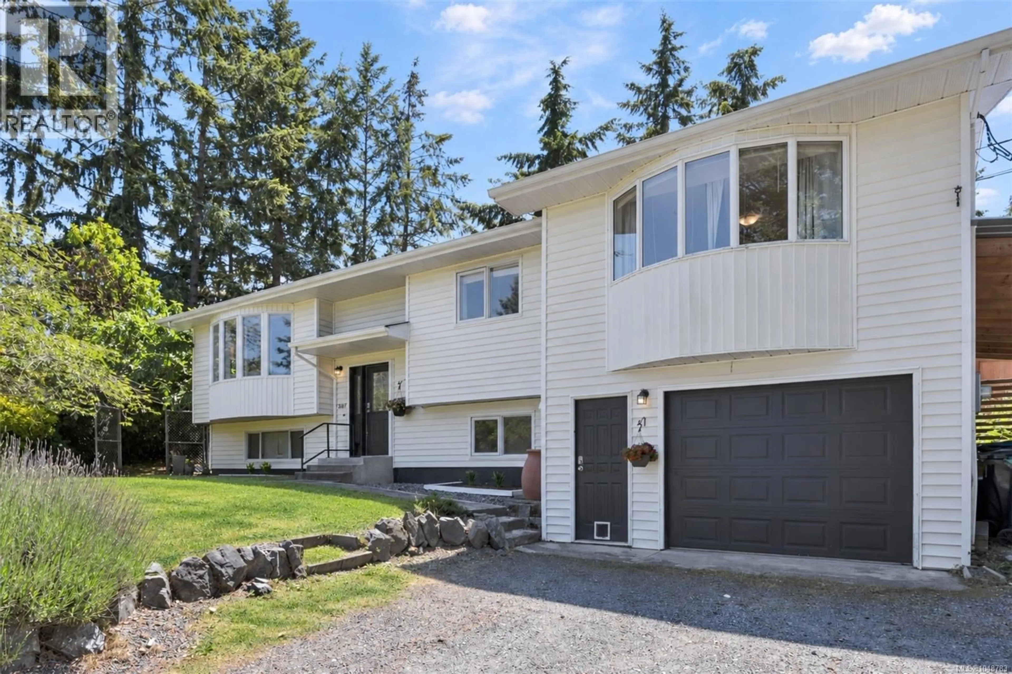 Home with vinyl exterior material, street for 7487 FOREST TURN WAY, Lantzville British Columbia V0R2H0