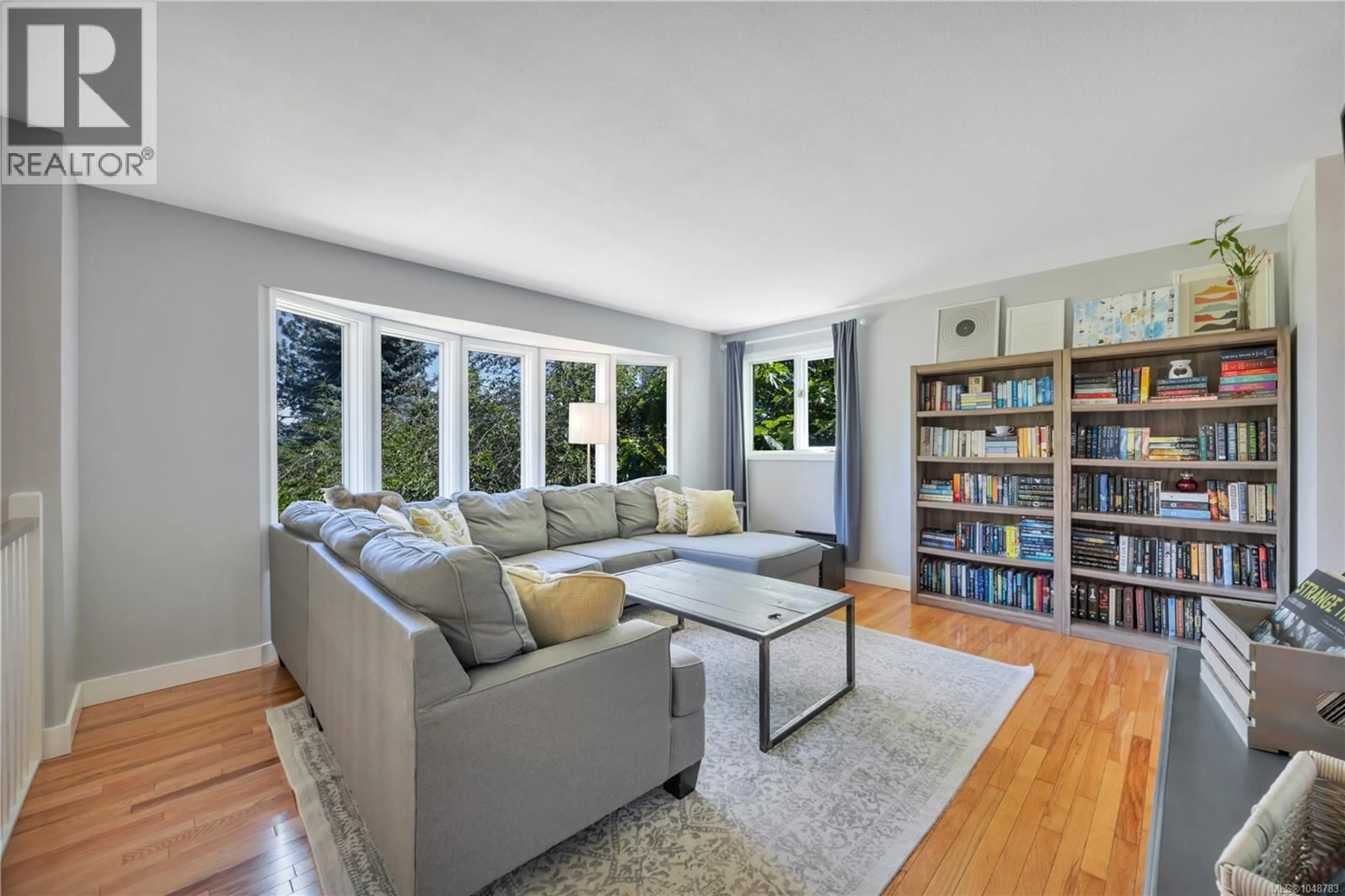 Living room with furniture, unknown for 7487 FOREST TURN WAY, Lantzville British Columbia V0R2H0