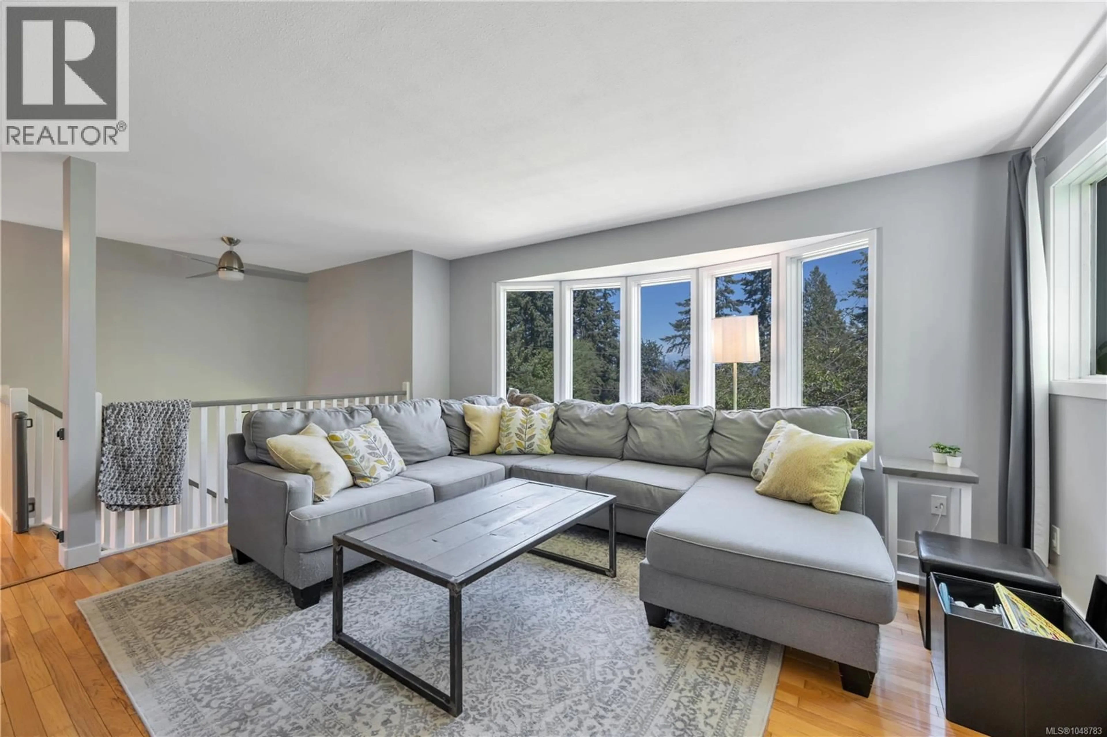 Living room with furniture, unknown for 7487 FOREST TURN WAY, Lantzville British Columbia V0R2H0