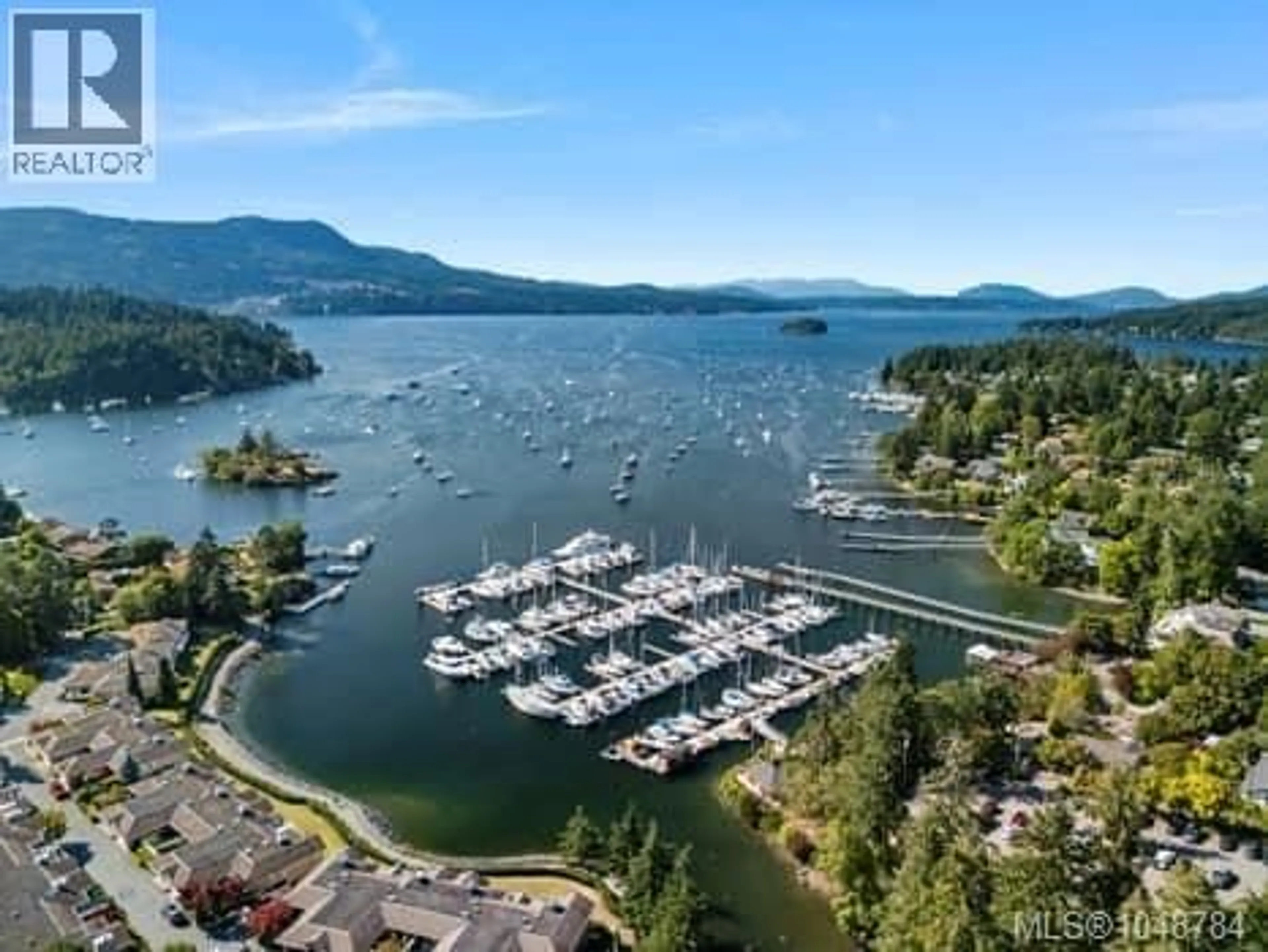 A pic from outside/outdoor area/front of a property/back of a property/a pic from drone, water/lake/river/ocean view for 108 - 6880 WALLACE DRIVE, Central Saanich British Columbia V8M1N8