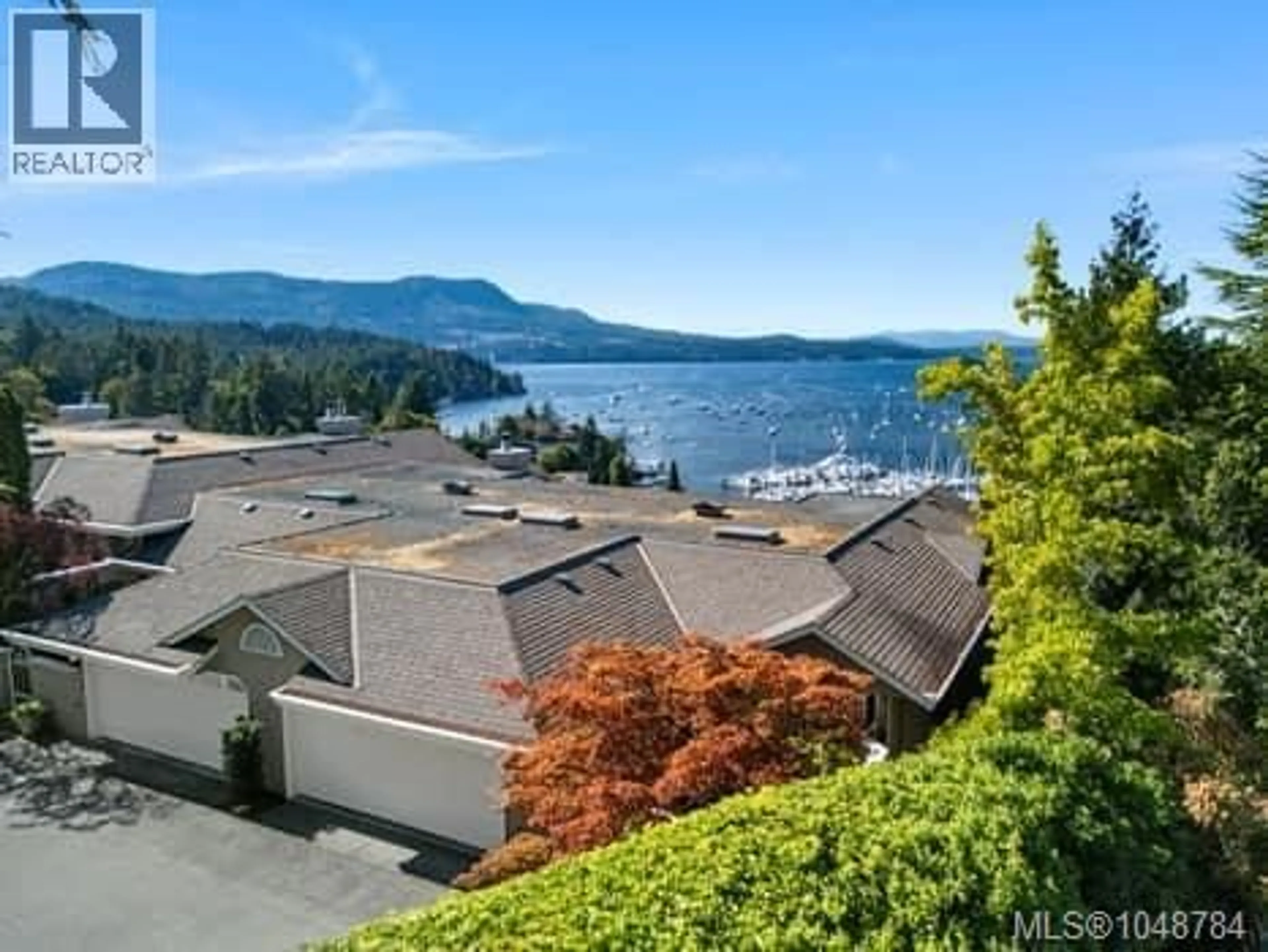 A pic from outside/outdoor area/front of a property/back of a property/a pic from drone, water/lake/river/ocean view for 108 - 6880 WALLACE DRIVE, Central Saanich British Columbia V8M1N8