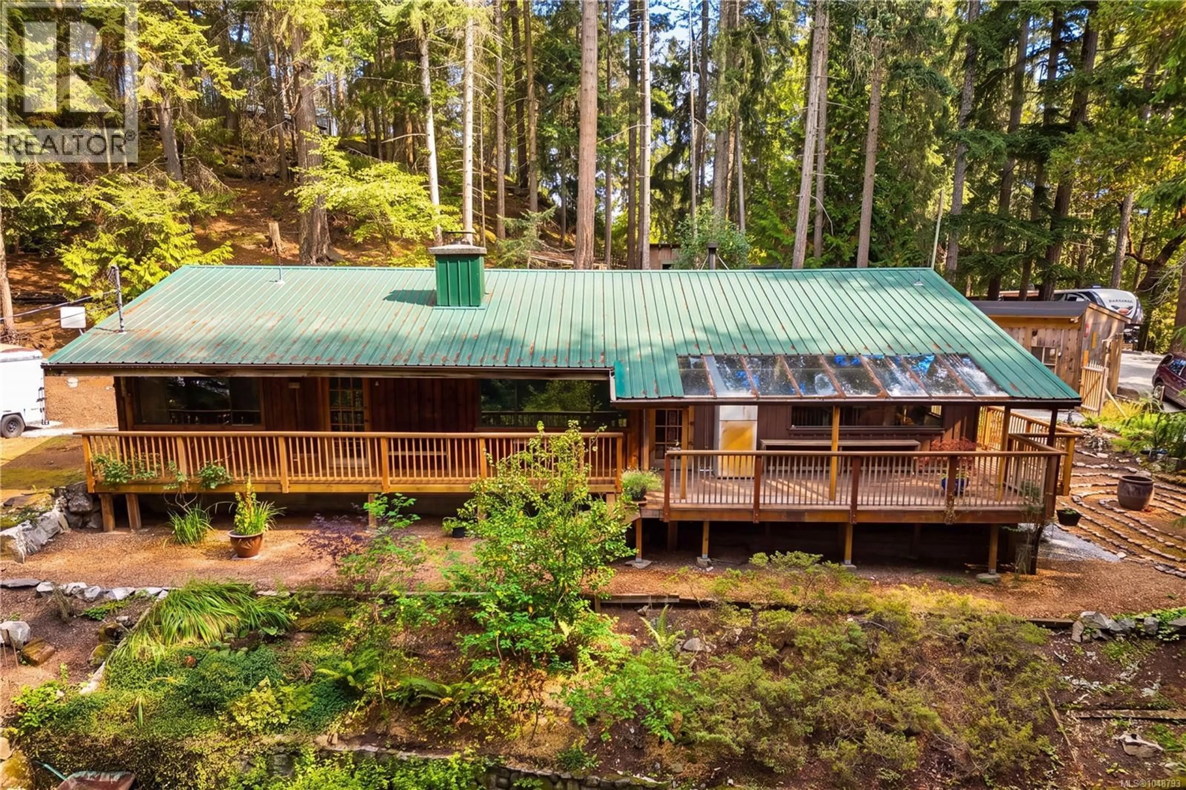 A pic from outside/outdoor area/front of a property/back of a property/a pic from drone, forest/trees view for 119 CREEKSIDE DRIVE, Salt Spring British Columbia V8K2E4