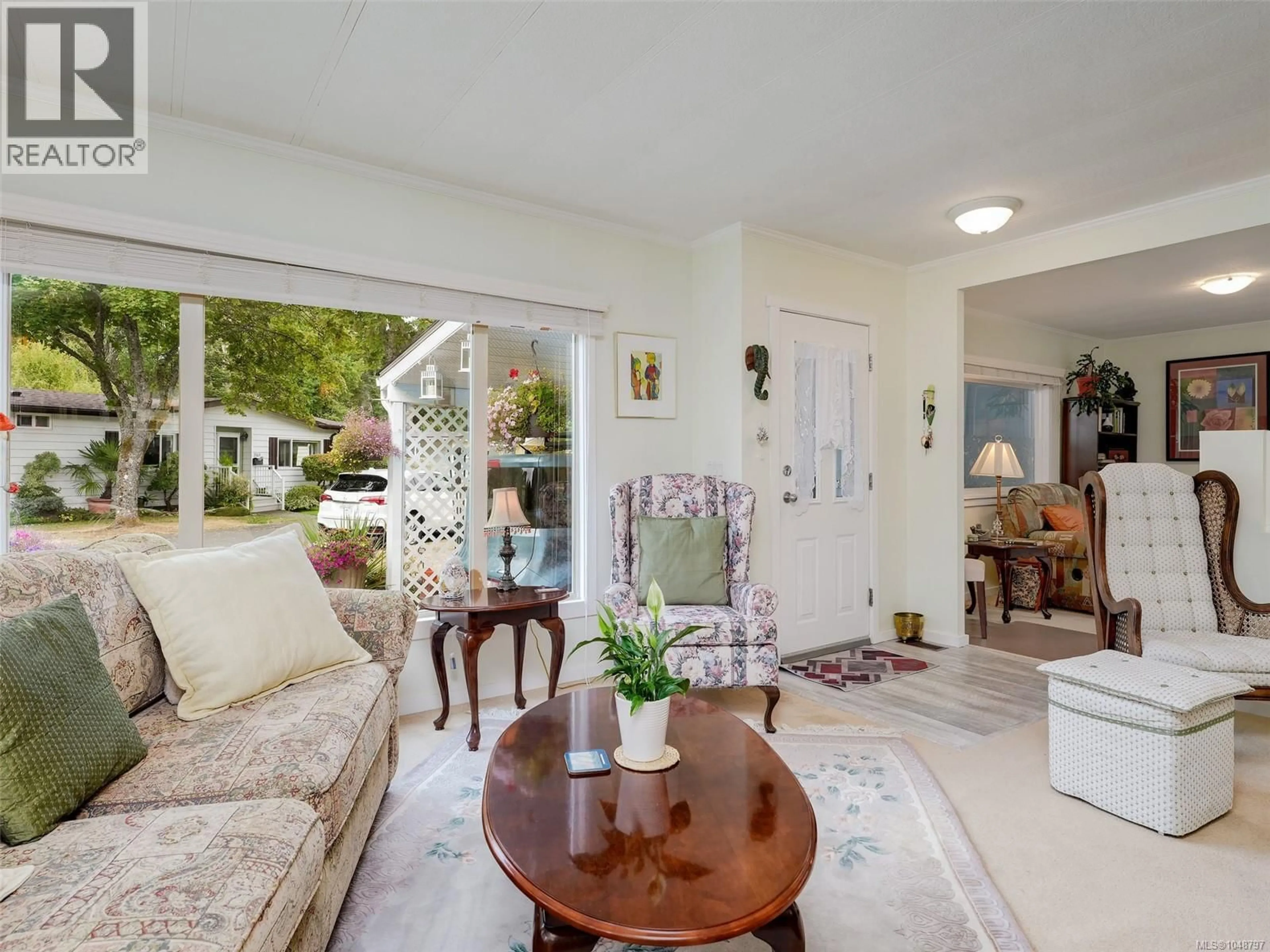 Living room with furniture, unknown for 2166 SUMMERGATE BOULEVARD, Sidney British Columbia V8L4L1