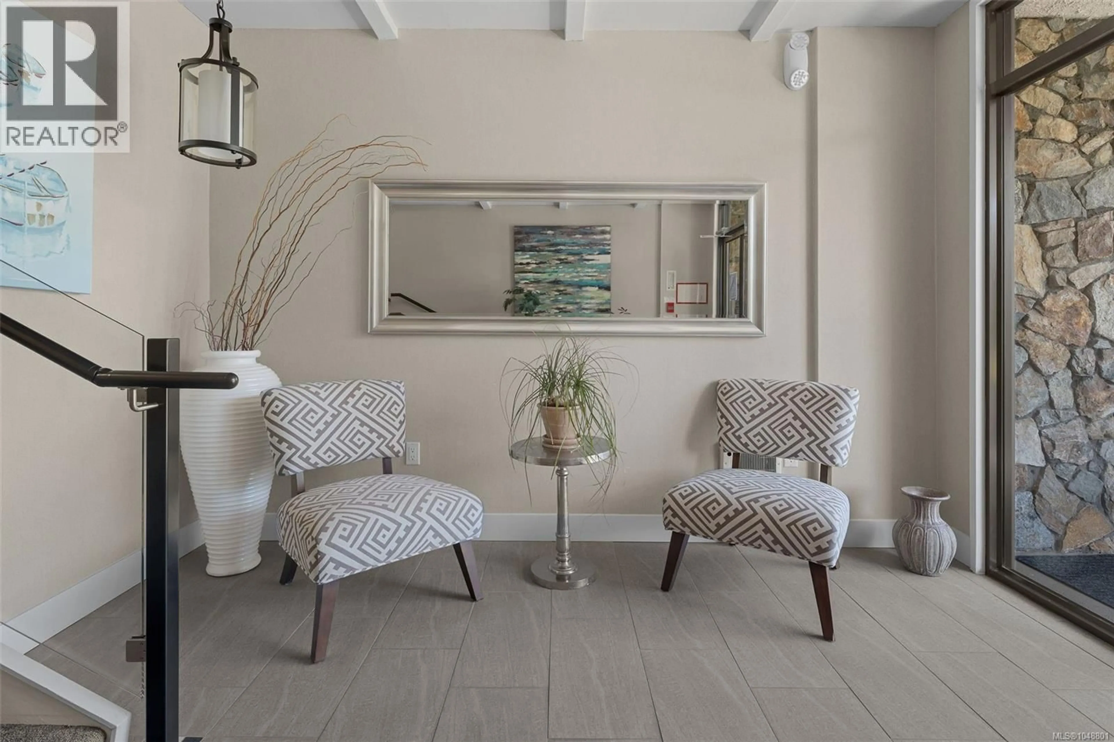 Living room with furniture, unknown for 105 - 1312 BEACH DRIVE, Oak Bay British Columbia V8S2N5