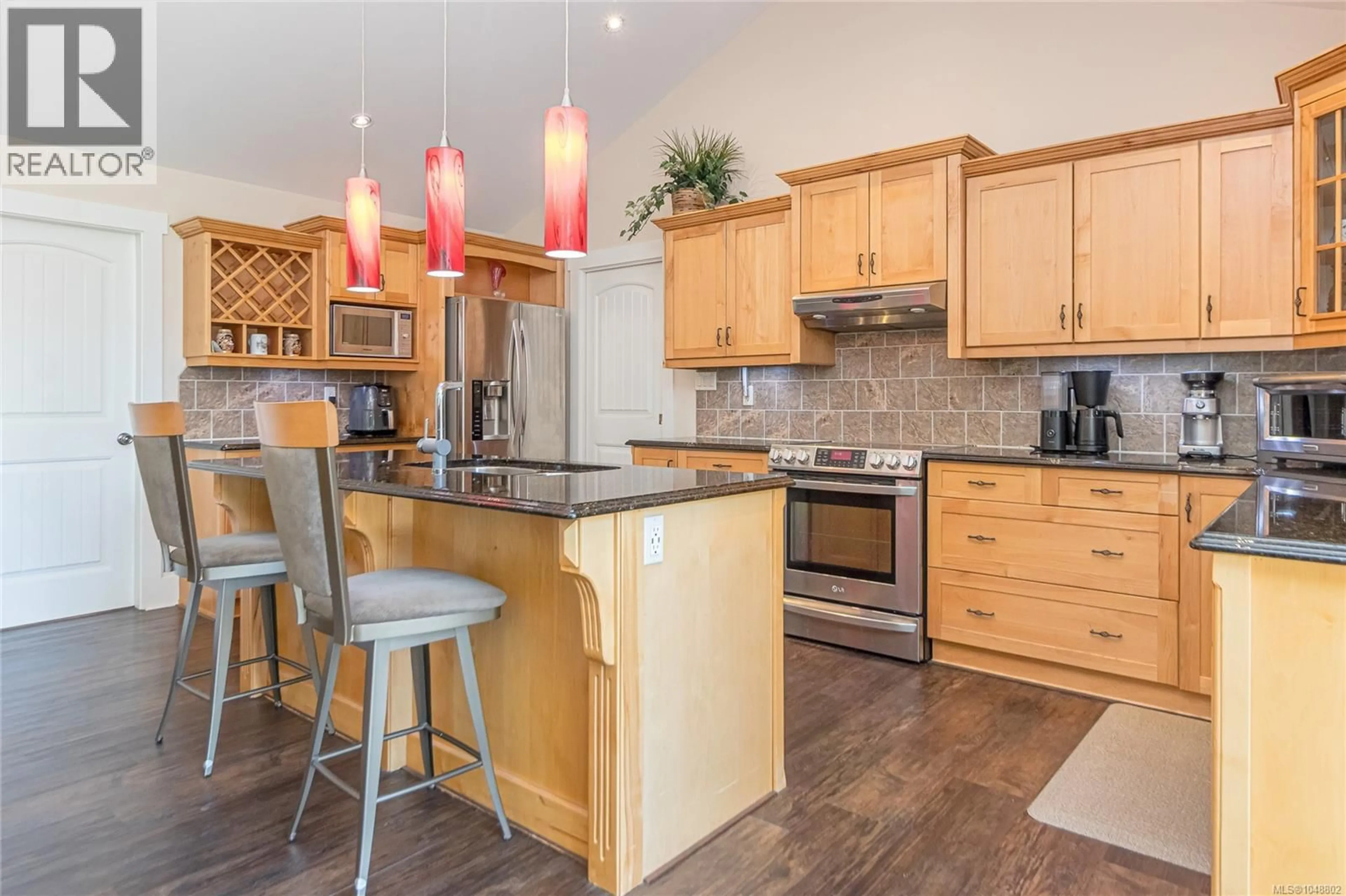 Open concept kitchen, wood/laminate floor for 1737 GALVIN PLACE, Qualicum Beach British Columbia V9K2V3