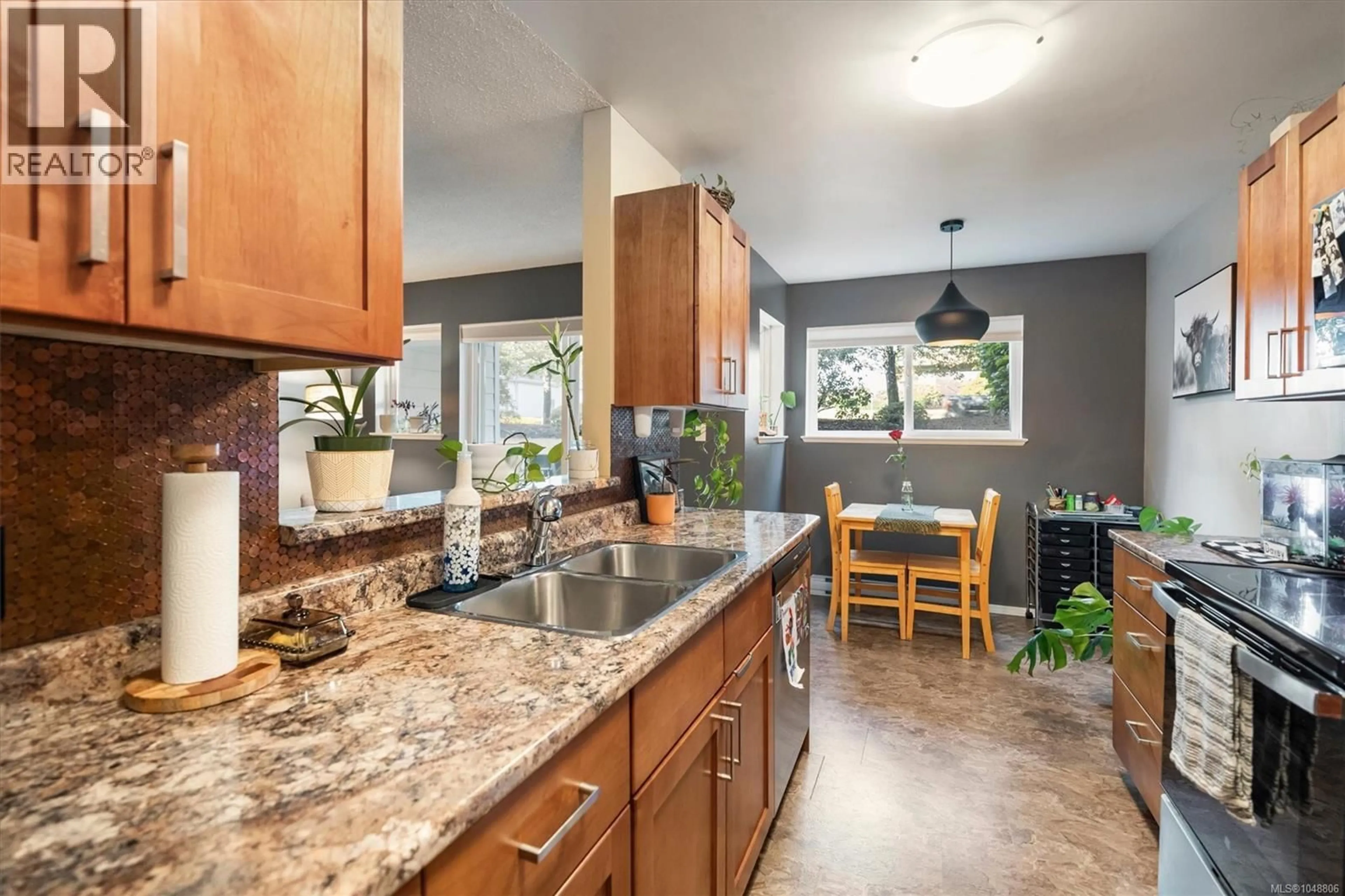 Open concept kitchen, ceramic/tile floor for 109C - 698 ASPEN ROAD, Comox British Columbia V3S3S9