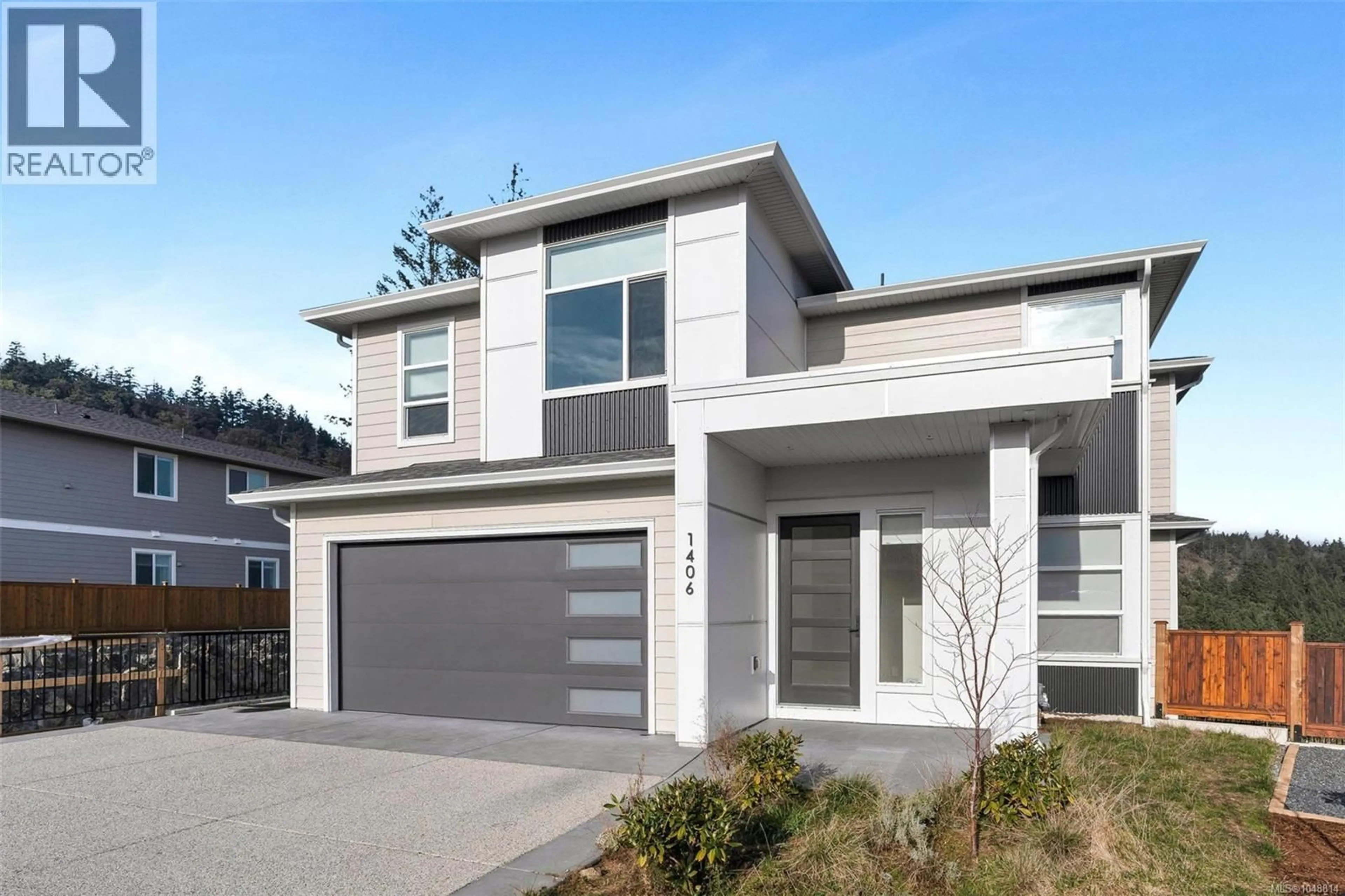 Home with vinyl exterior material, street for 1406 SANDSTONE LANE, Langford British Columbia V9B7A2