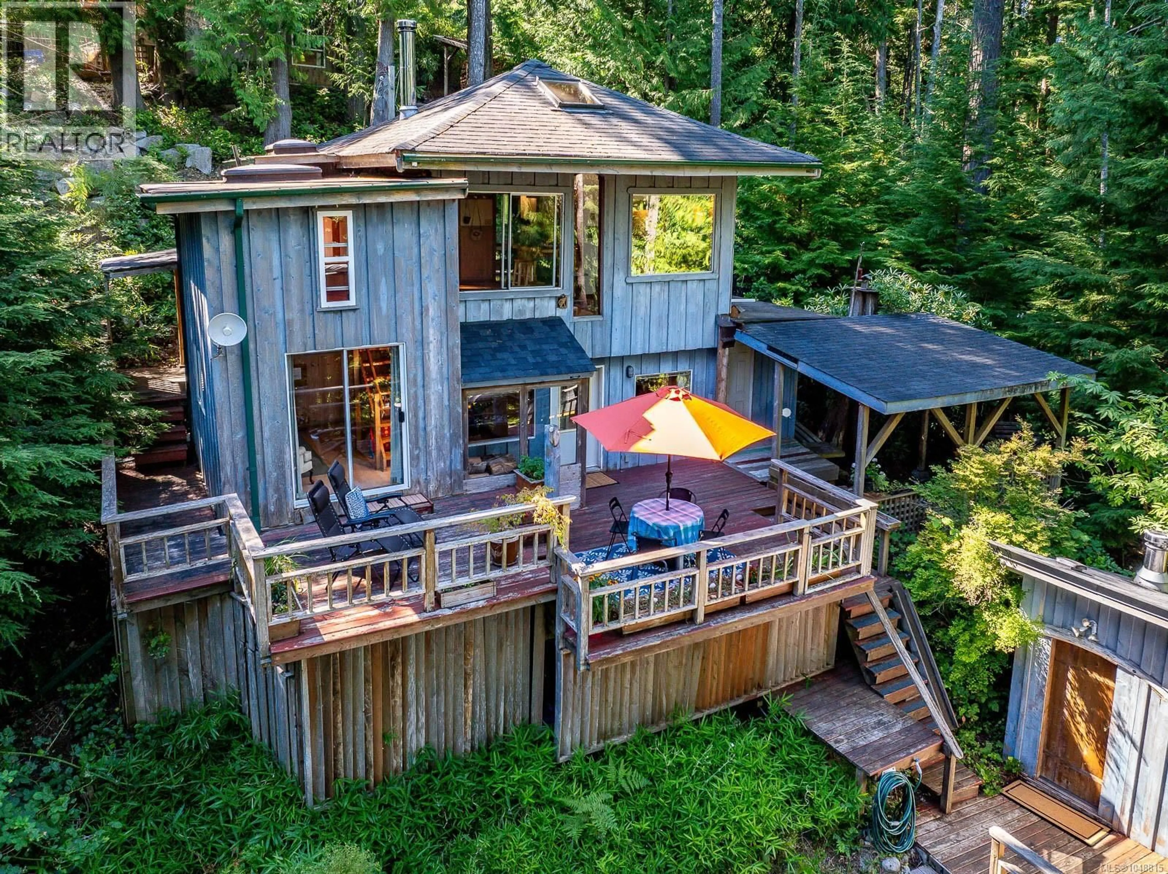 A pic from outside/outdoor area/front of a property/back of a property/a pic from drone, forest/trees view for 838 SUTIL POINT ROAD, Cortes Island British Columbia V0P1K0