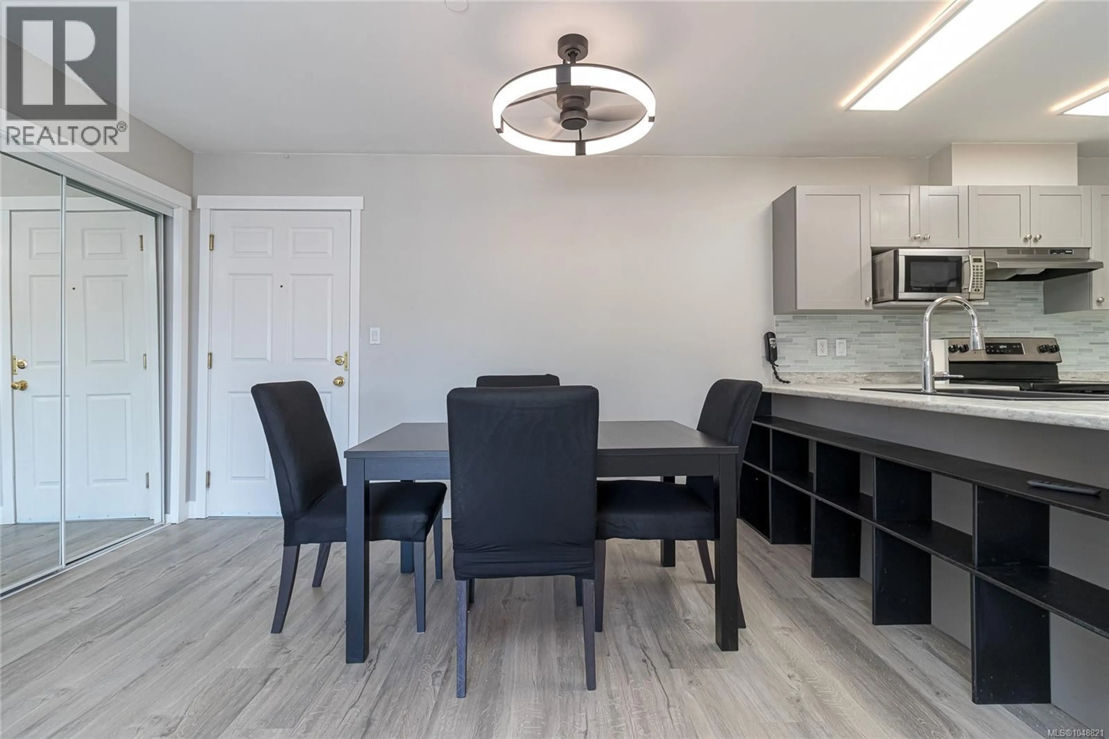Open concept kitchen, wood/laminate floor for 401 - 893 HOCKLEY AVENUE, Langford British Columbia V9B2V8