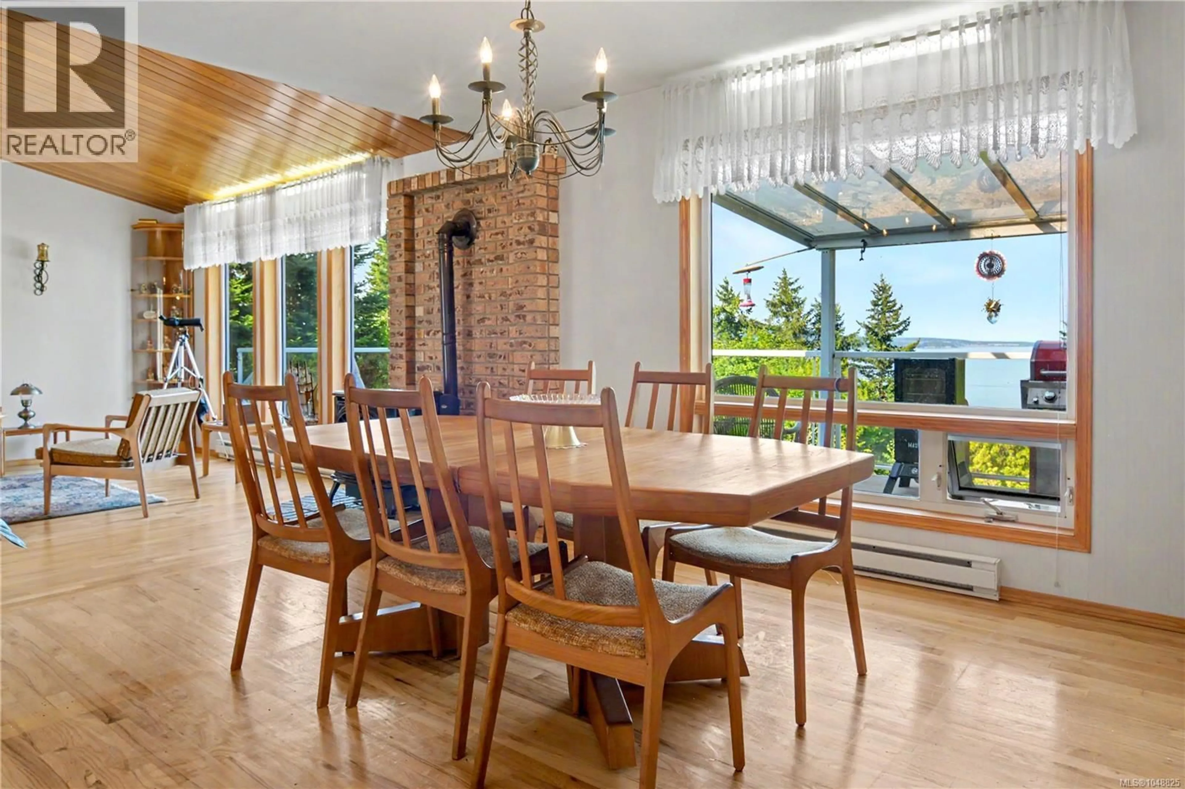 Dining room, wood/laminate floor for 131 MELVIN CRESCENT, Bowser British Columbia V0R1G0