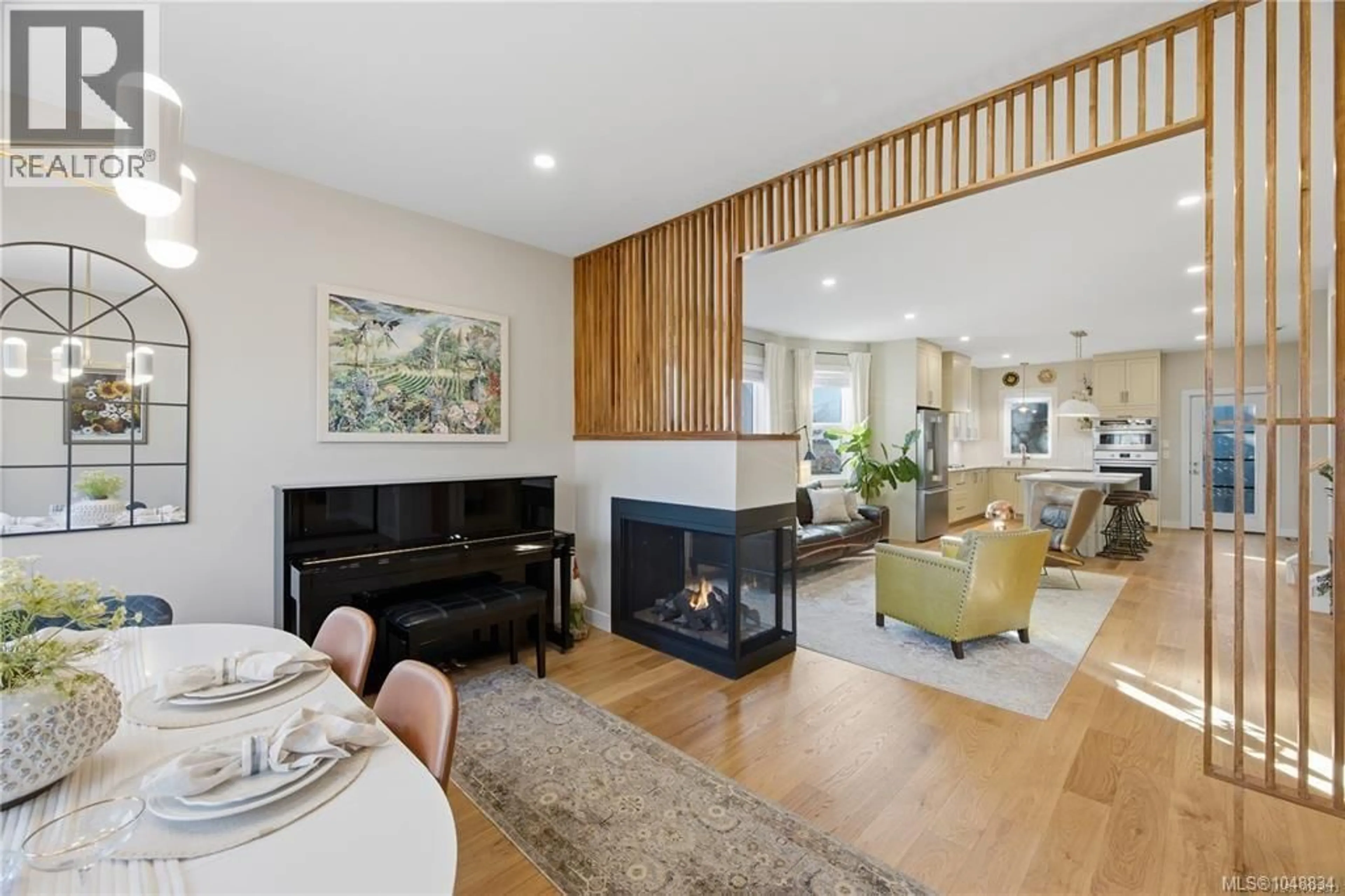Living room with furniture, wood/laminate floor for 525 SUMAS STREET, Victoria British Columbia V8T4S4