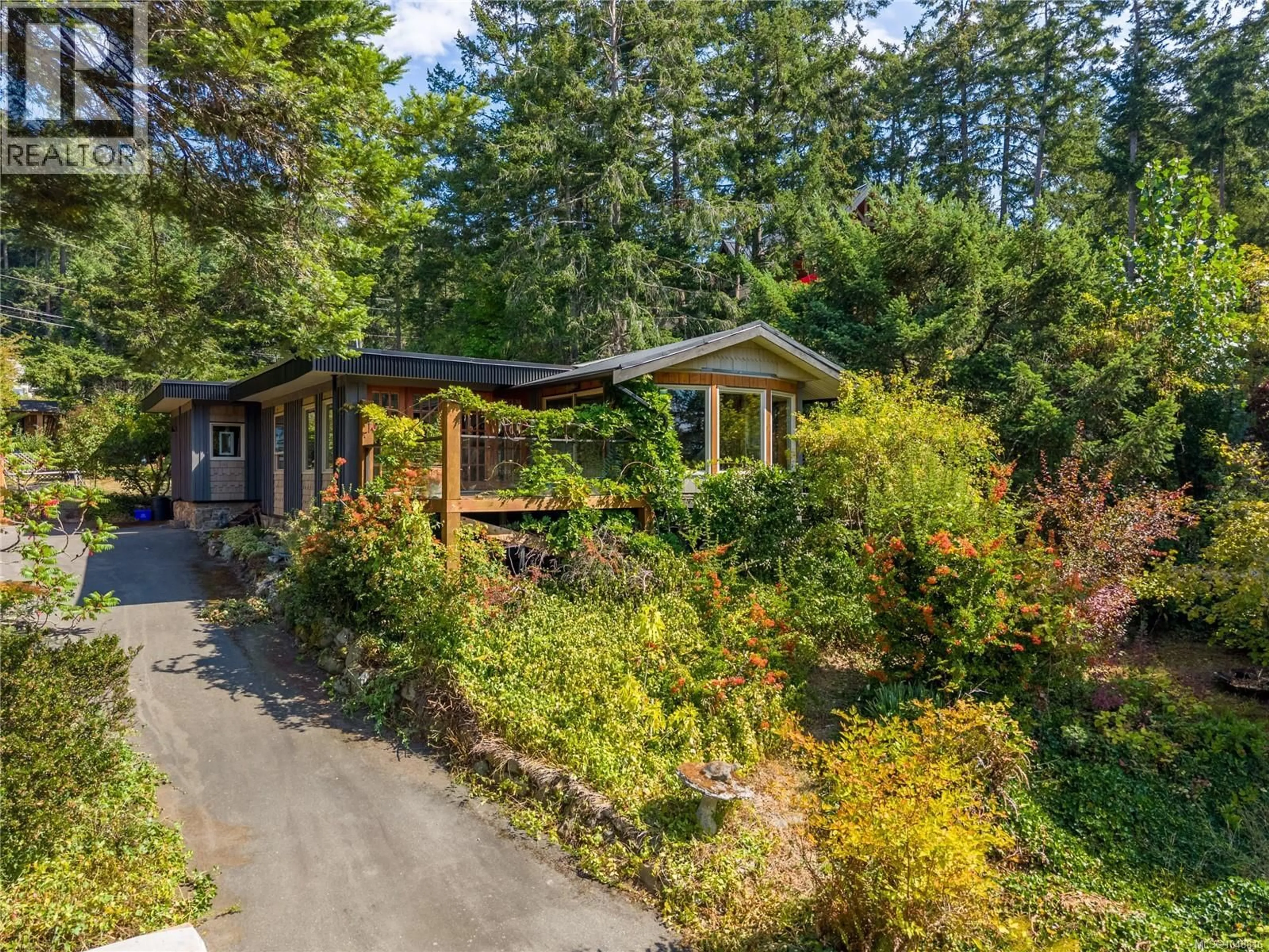 A pic from outside/outdoor area/front of a property/back of a property/a pic from drone, street for 3707 ROPE ROAD, Pender Island British Columbia V0N2M2