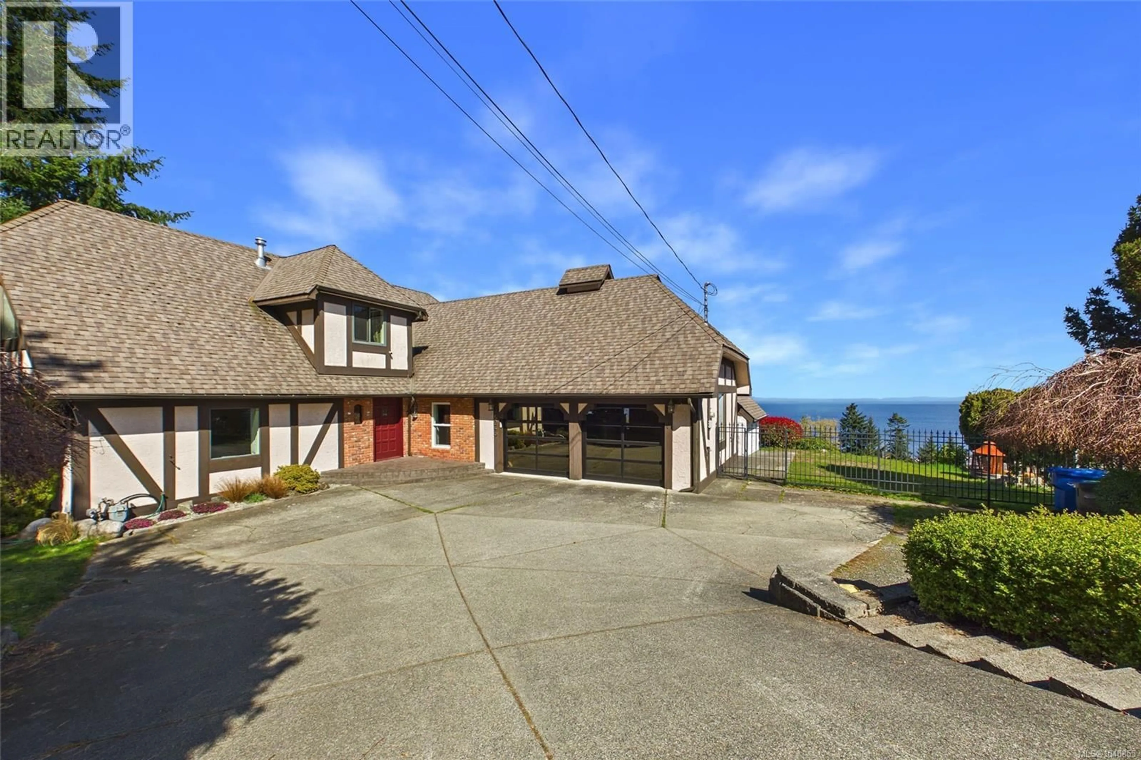 A pic from outside/outdoor area/front of a property/back of a property/a pic from drone, water/lake/river/ocean view for 5246 LOST LAKE ROAD, Nanaimo British Columbia V9T5E5