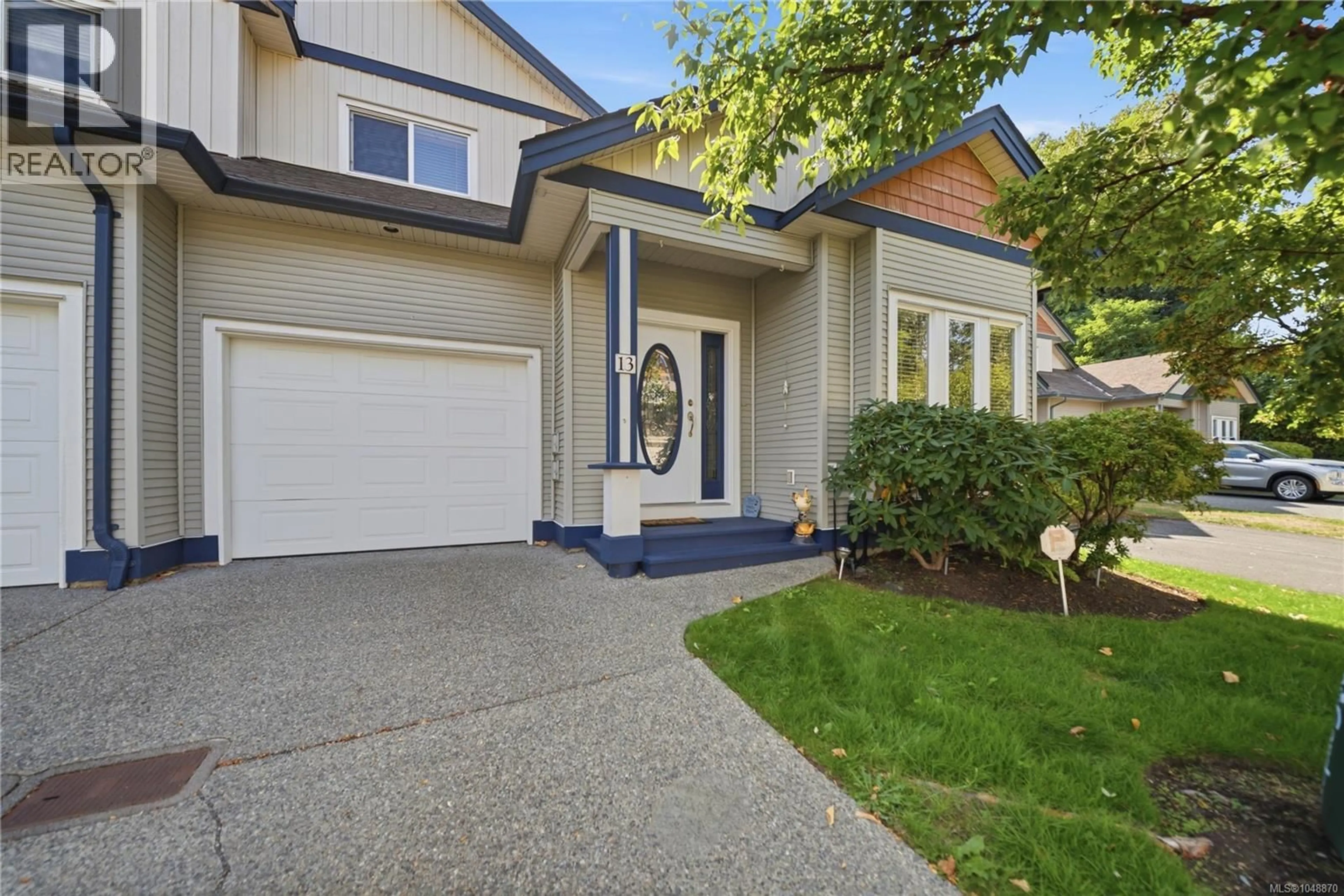 Home with vinyl exterior material, street for 13 - 6078 TRUESDALE STREET, Duncan British Columbia V9L0B4