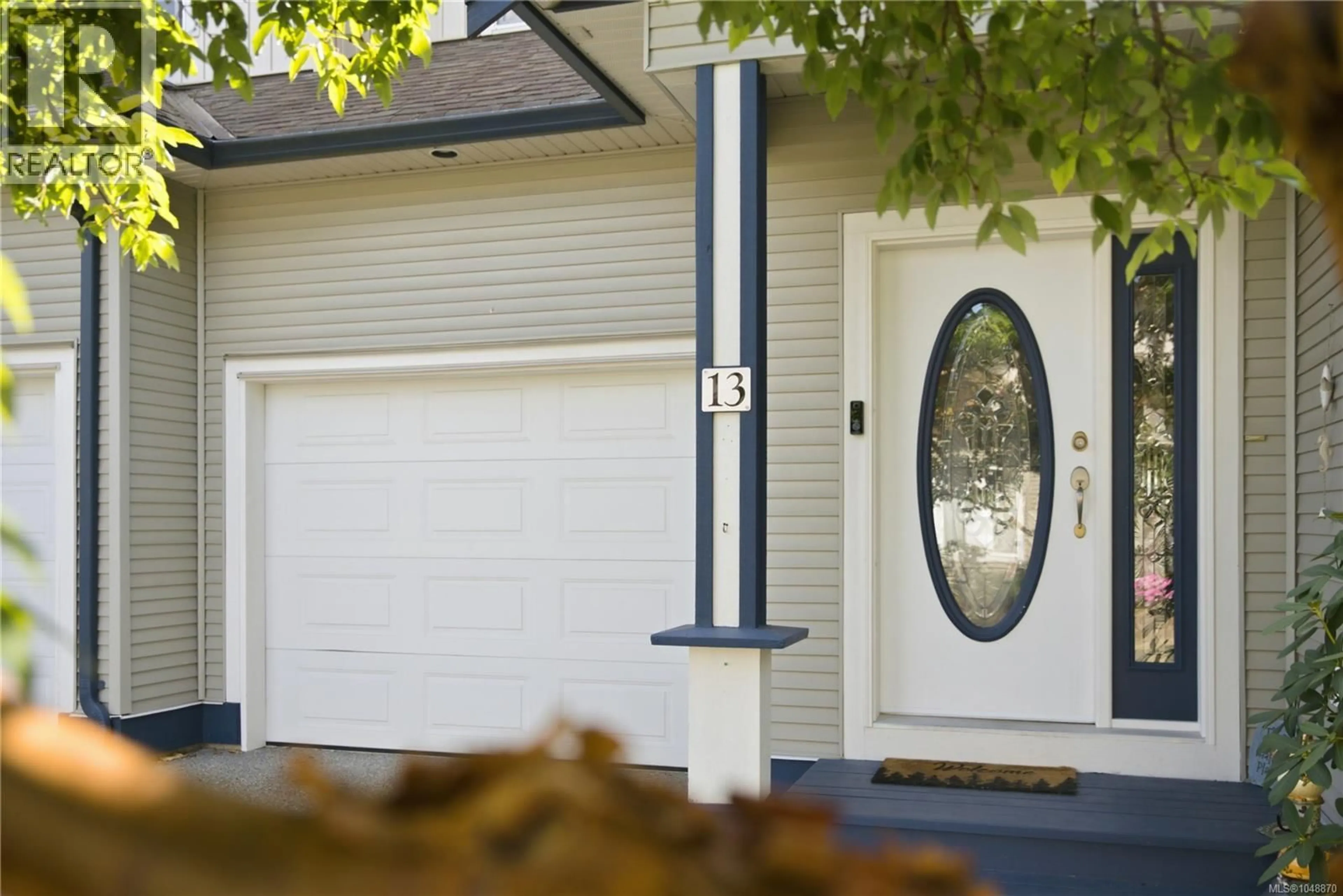 Home with vinyl exterior material, street for 13 - 6078 TRUESDALE STREET, Duncan British Columbia V9L0B4