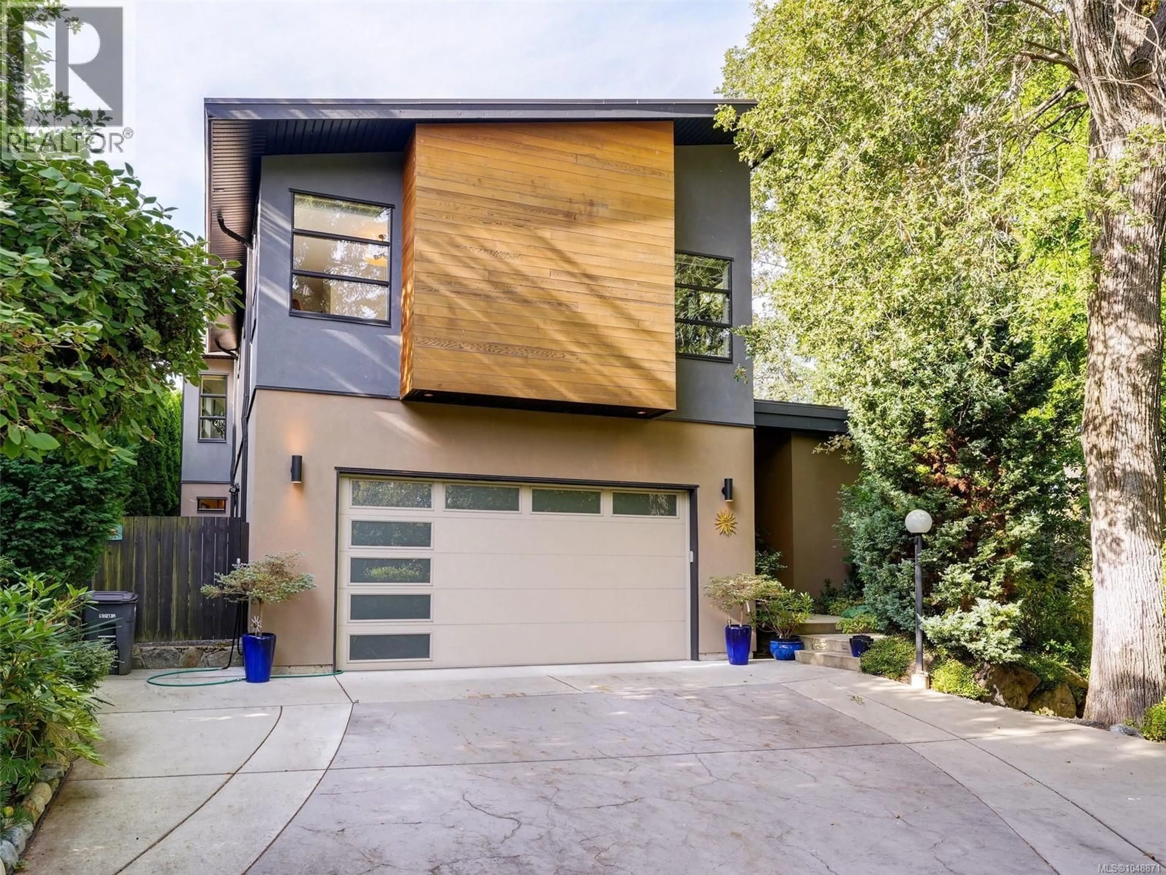 Home with brick exterior material, street for 1047 SAN MARINO CRESCENT, Saanich British Columbia V8X3B3