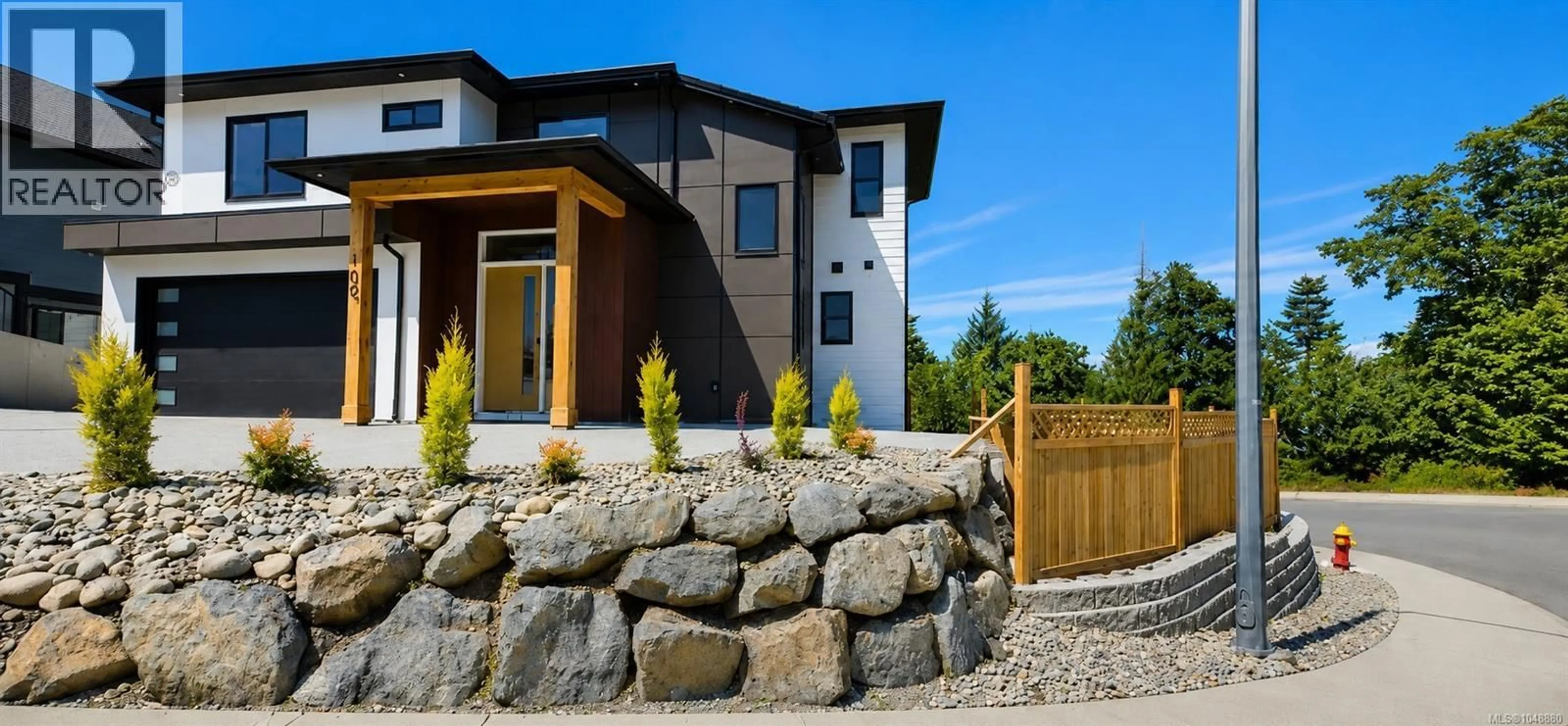 Home with brick exterior material, street for 100 ROYAL PACIFIC WAY, Nanaimo British Columbia V9T5L7