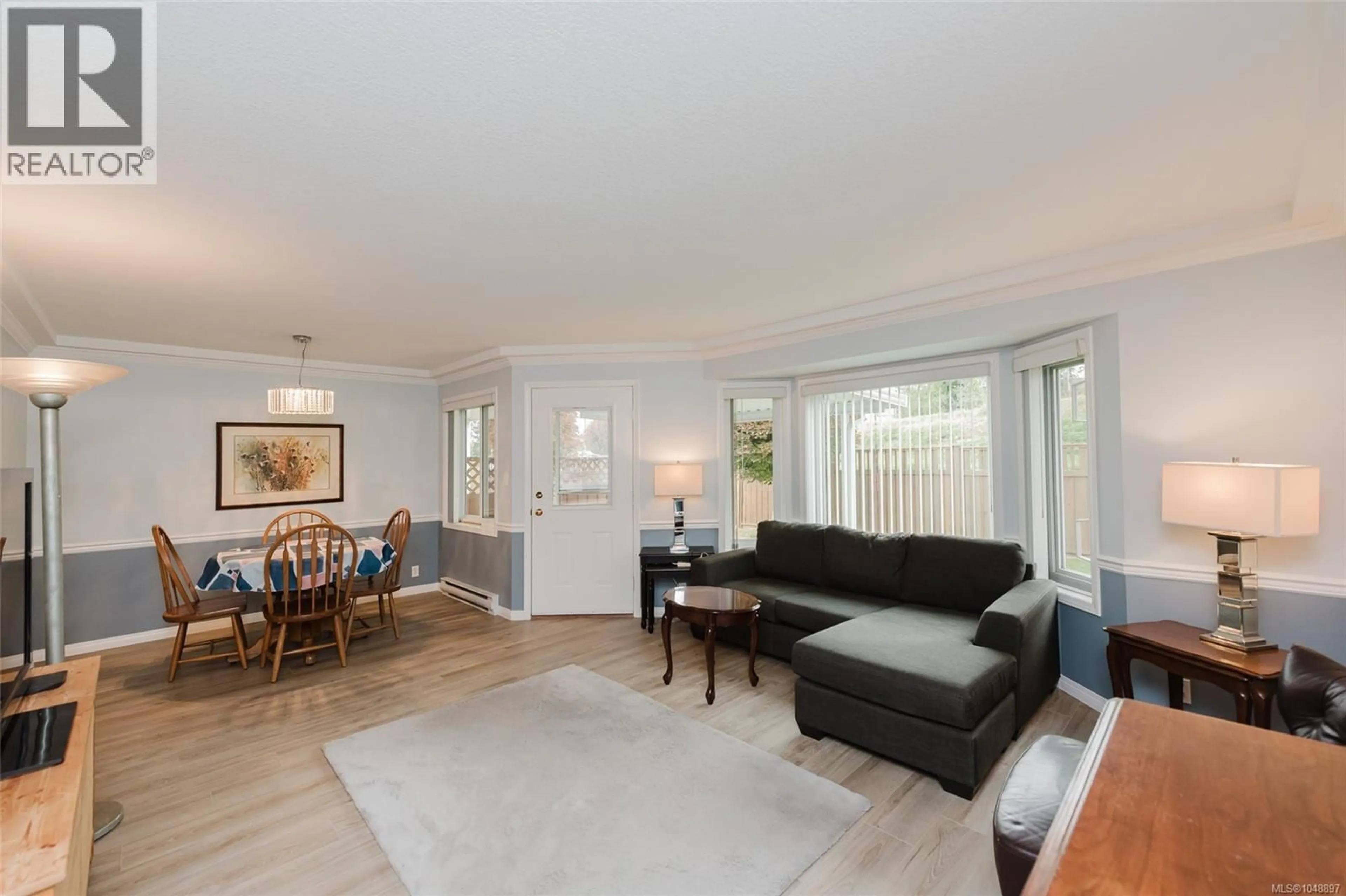Living room with furniture, wood/laminate floor for 9 - 1351 TUNNER DRIVE, Courtenay British Columbia V9N8V6