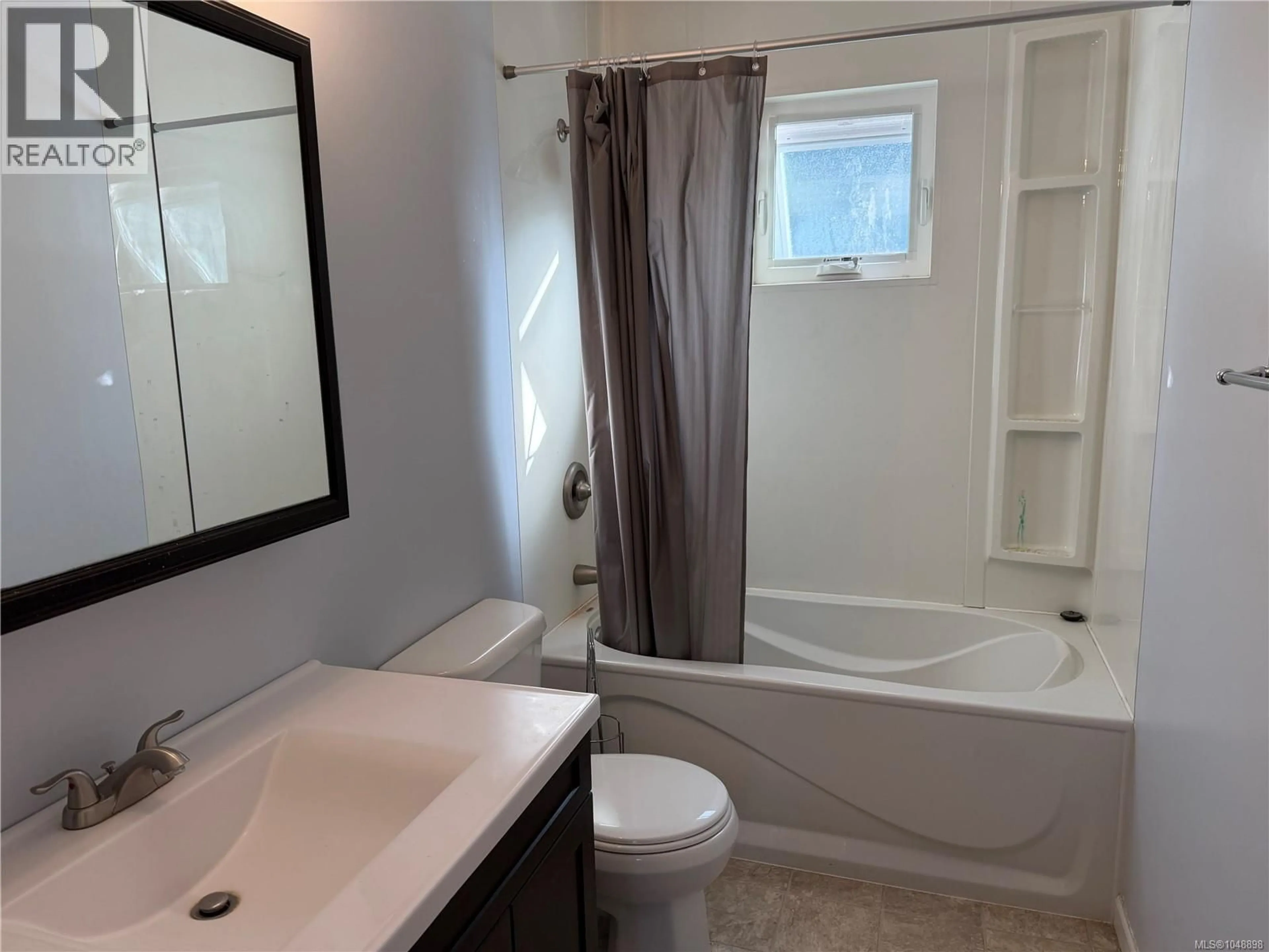 Standard bathroom, ceramic/tile floor for 69 MCKAY CRESCENT, Port Alice British Columbia V0N2N0