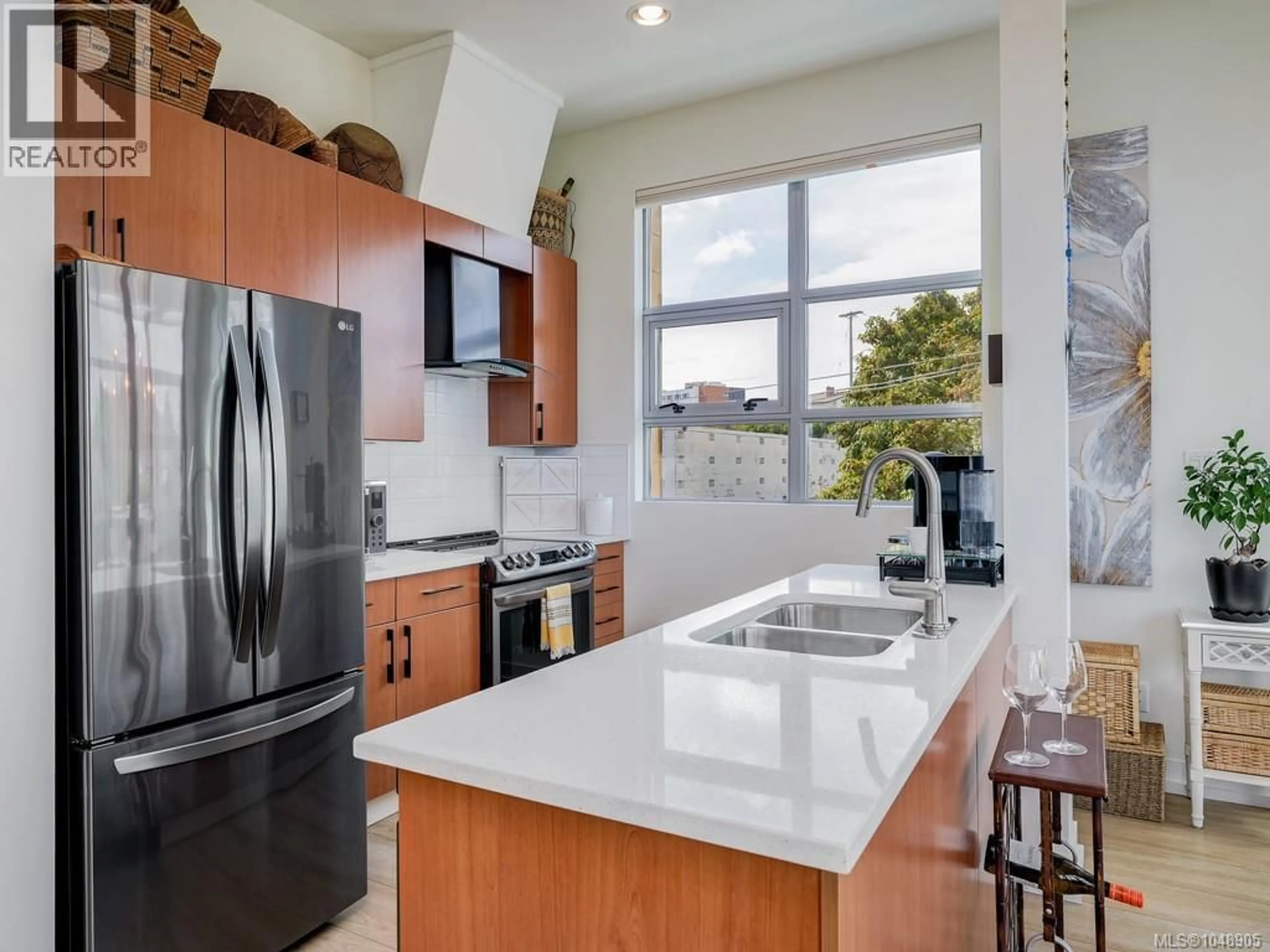 Contemporary kitchen, ceramic/tile floor for 401 - 797 TYEE ROAD, Victoria British Columbia V9A7R4