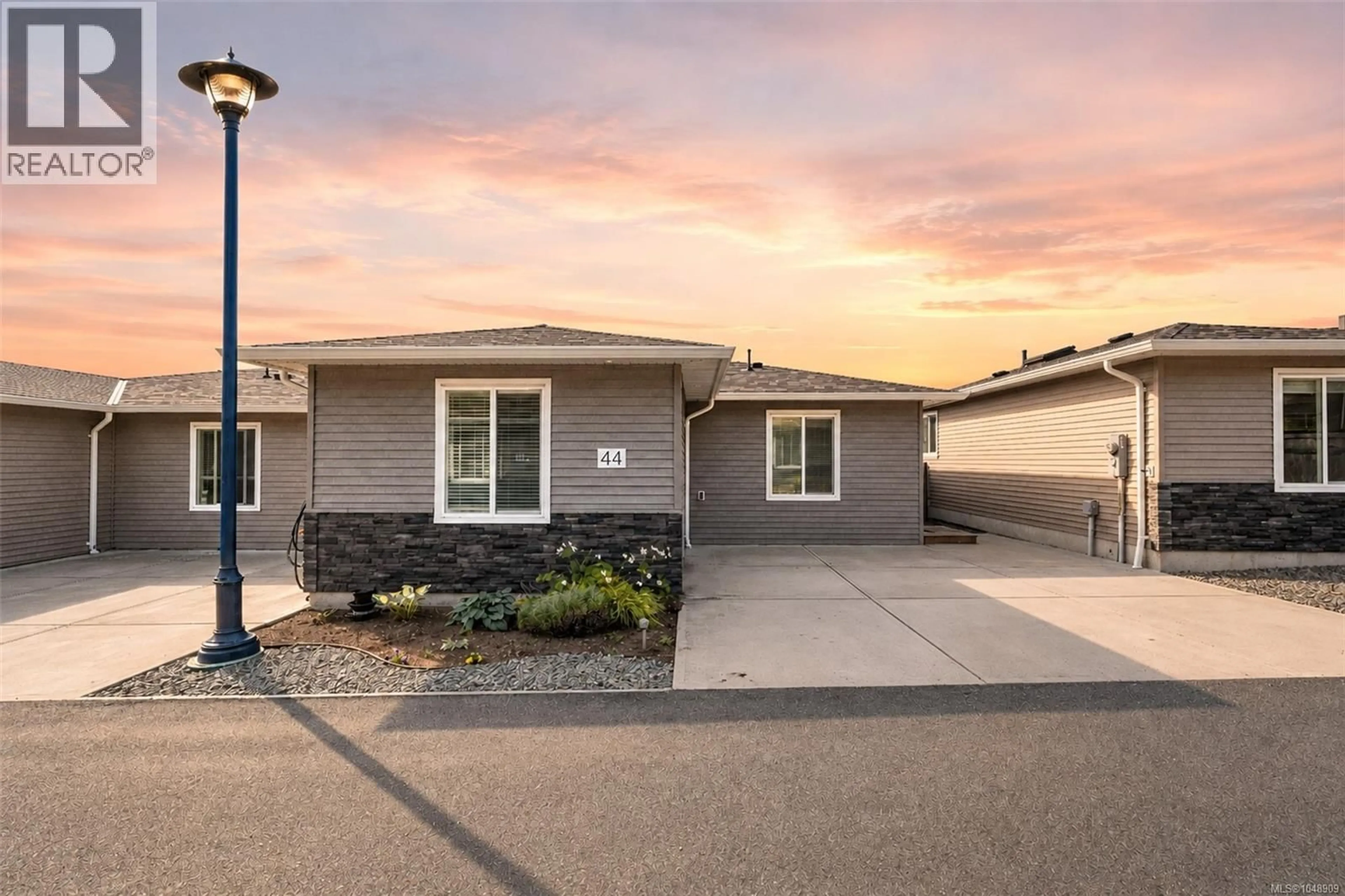 Home with vinyl exterior material, street for 44 - 7650 QWUC CHUS LANE, Central Saanich British Columbia V8M0B4