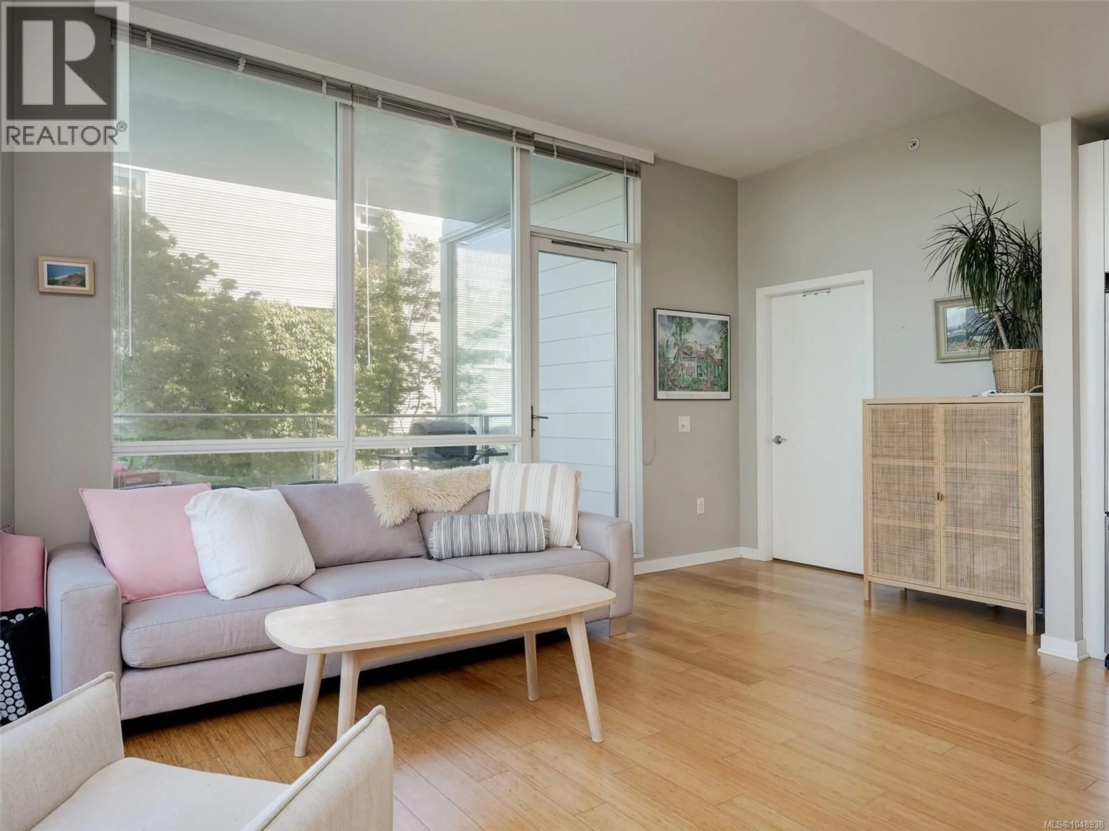 Living room with furniture, unknown for 105 - 399 TYEE ROAD, Victoria British Columbia V9A0A8