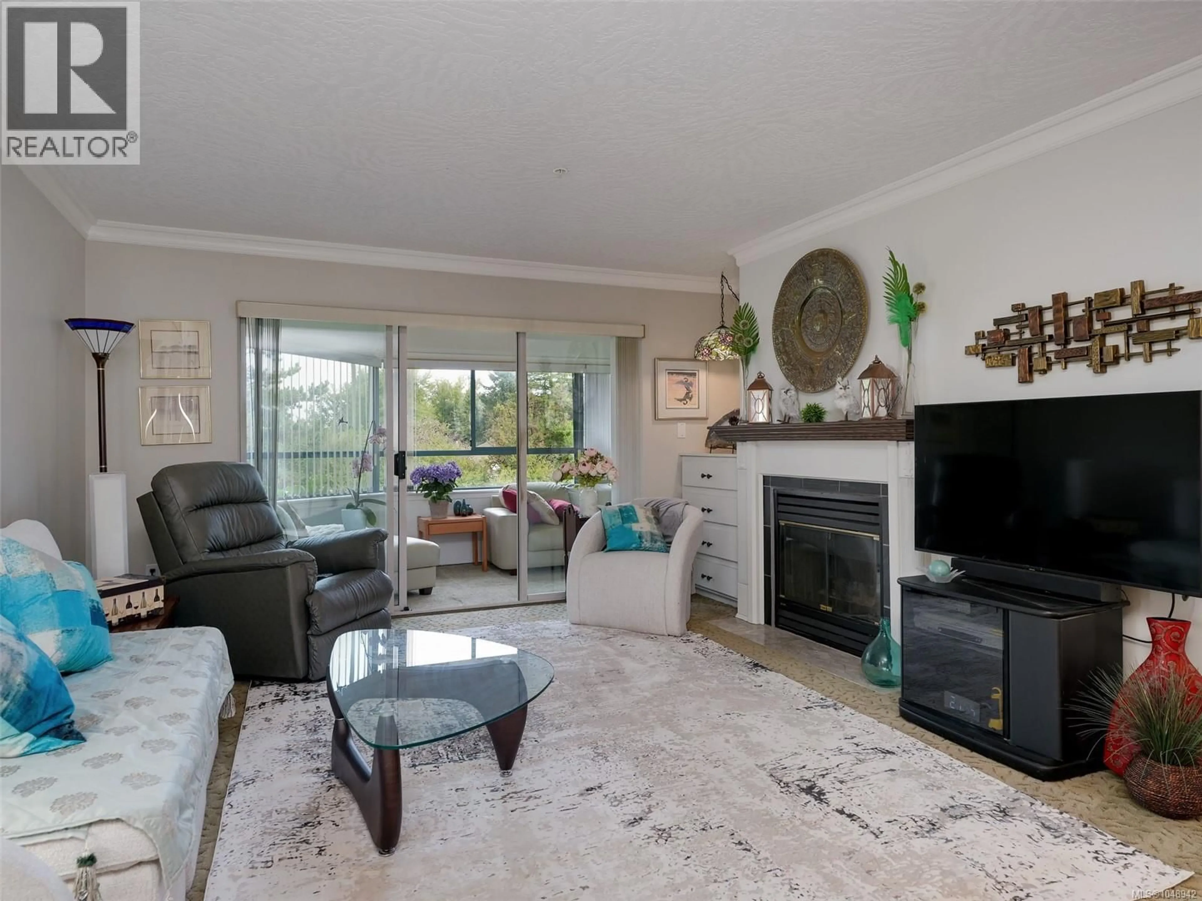 Living room with furniture, unknown for 207 - 1100 UNION ROAD, Saanich British Columbia V8P2J3