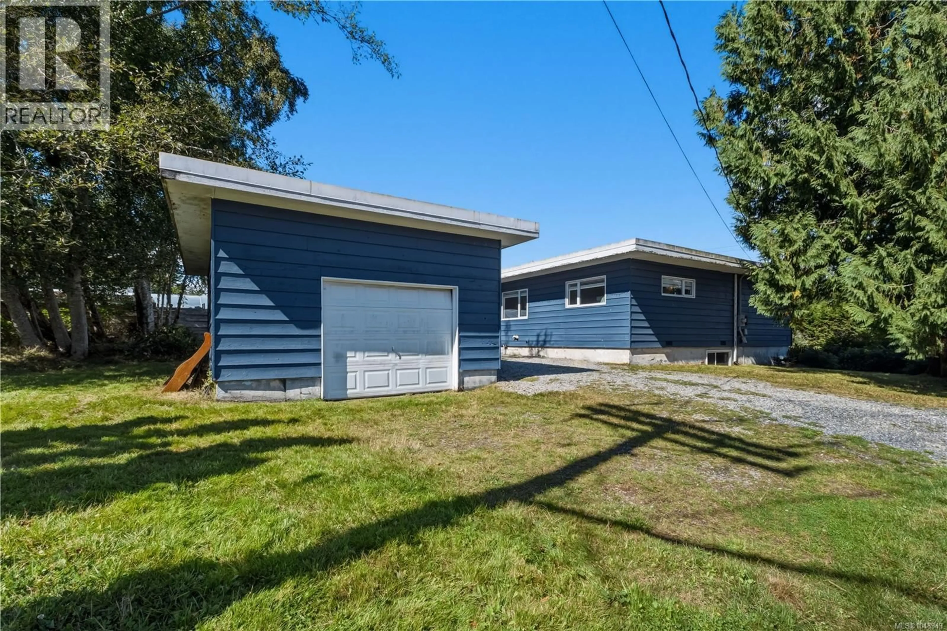 Home with vinyl exterior material, street for 1802 PENINSULA ROAD, Ucluelet British Columbia V0R3A0