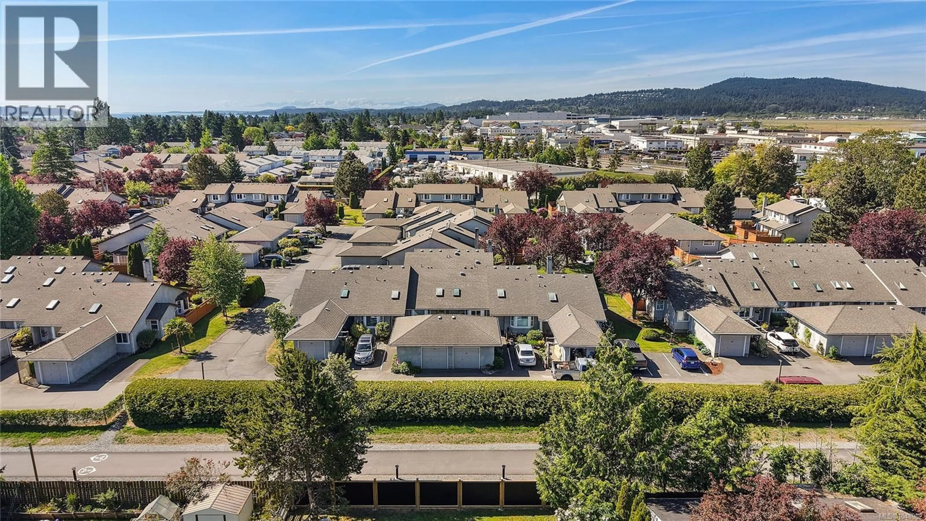 A pic from outside/outdoor area/front of a property/back of a property/a pic from drone, mountain view for 23 - 2070 AMELIA AVENUE, Sidney British Columbia V8L4X6