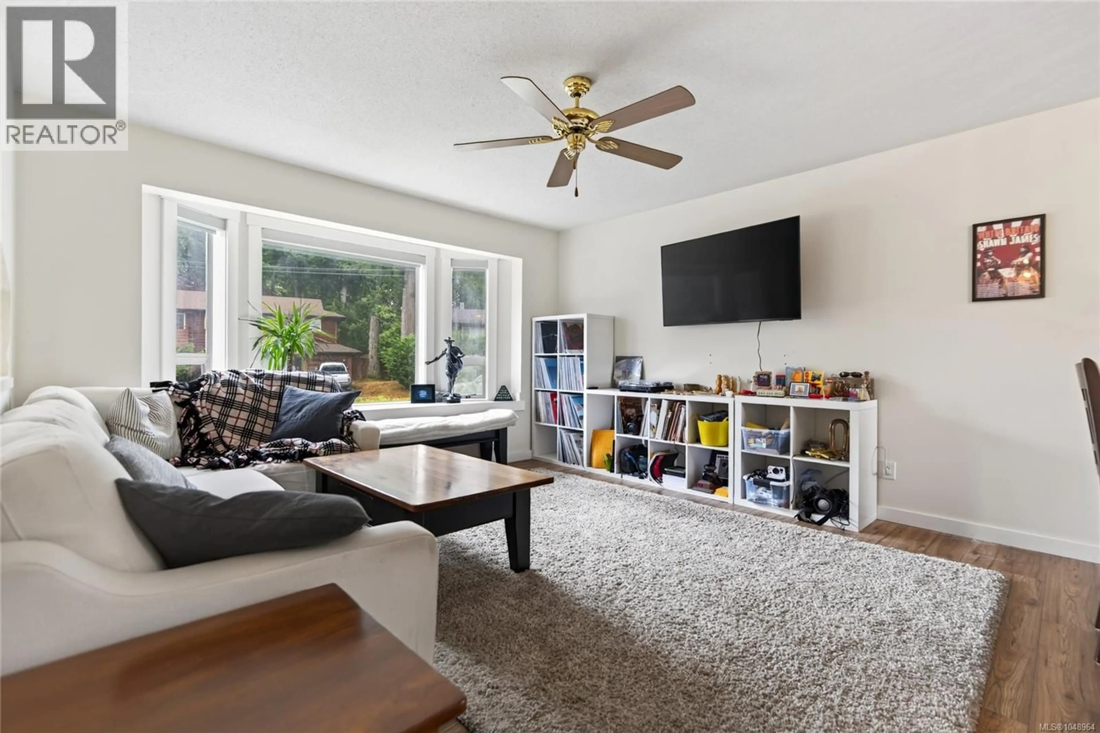 Living room with furniture, unknown for 1561 EMBLETON CRESCENT, Courtenay British Columbia V9N6N7