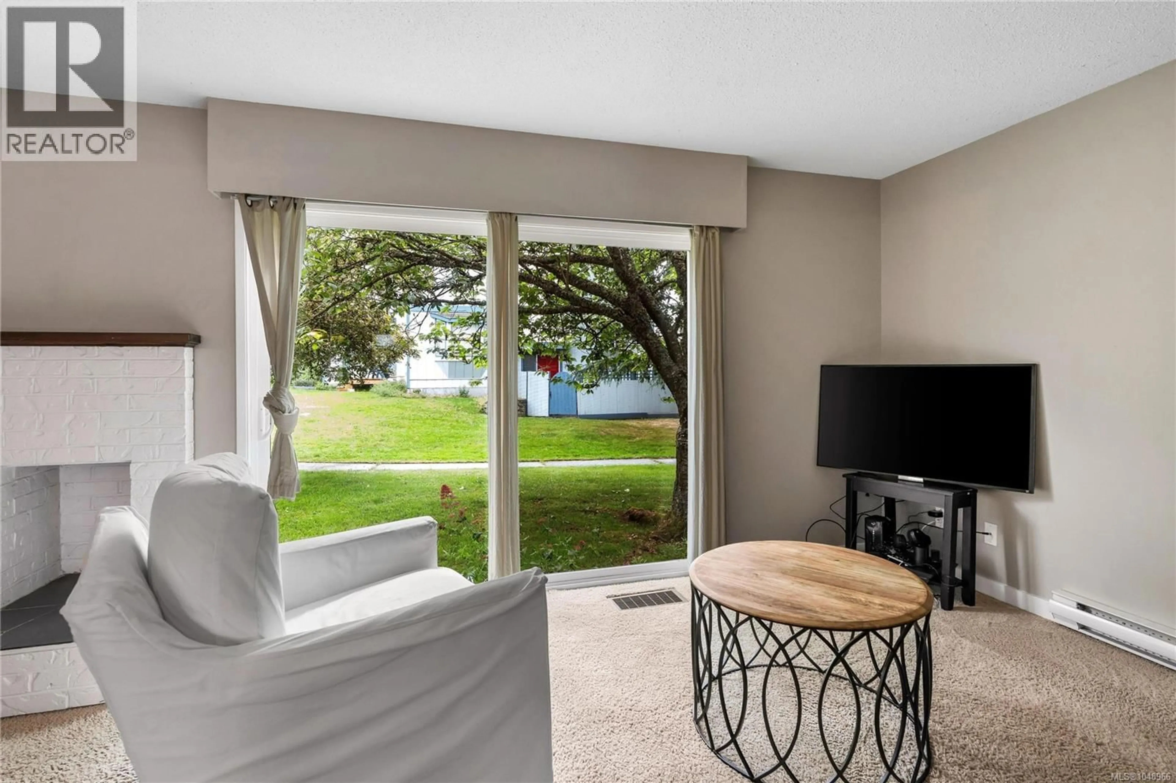 Living room with furniture, unknown for 4 - 3987 GORDON HEAD ROAD, Saanich British Columbia V8N3X5