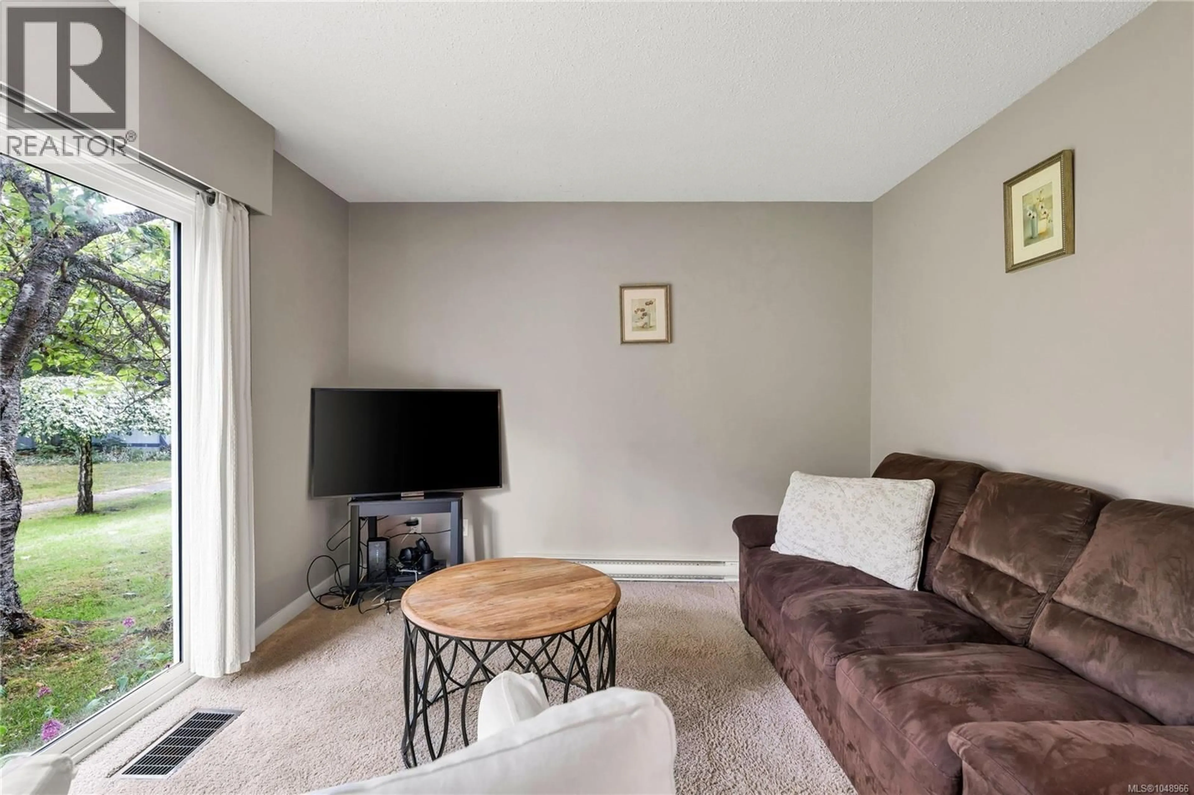 Living room with furniture, unknown for 4 - 3987 GORDON HEAD ROAD, Saanich British Columbia V8N3X5