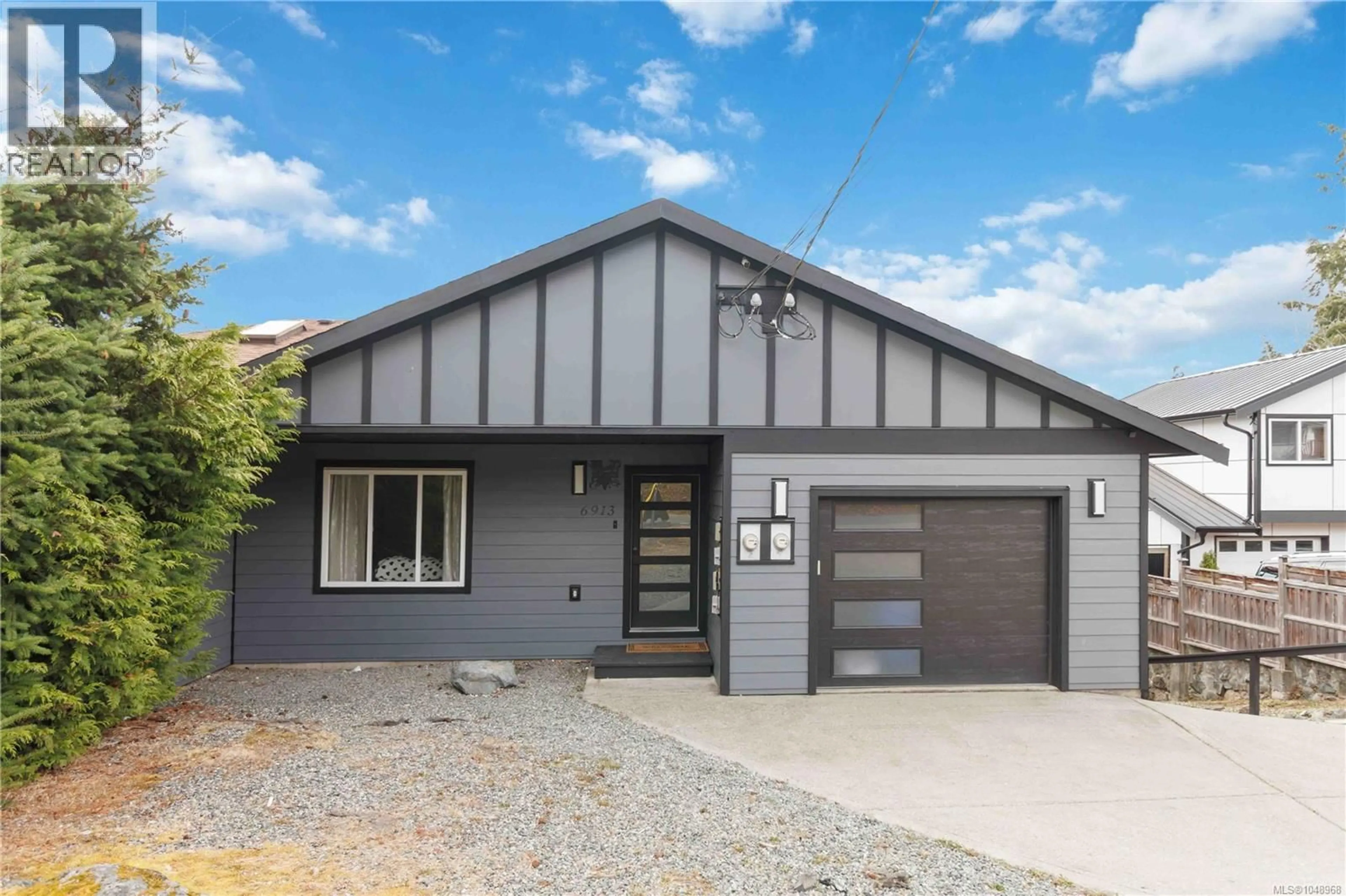 Home with vinyl exterior material, street for 6913 LARKSPUR ROAD, Sooke British Columbia V9Z1N0