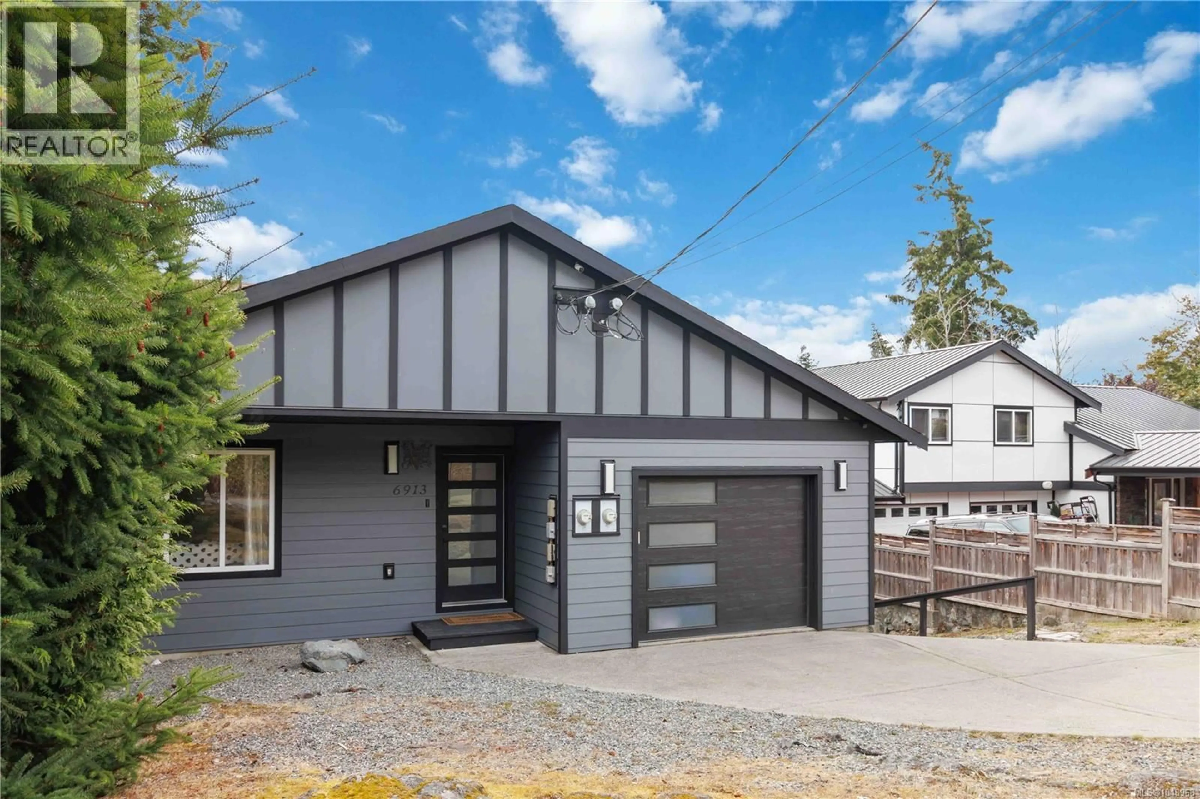 Home with vinyl exterior material, street for 6913 LARKSPUR ROAD, Sooke British Columbia V9Z1N0