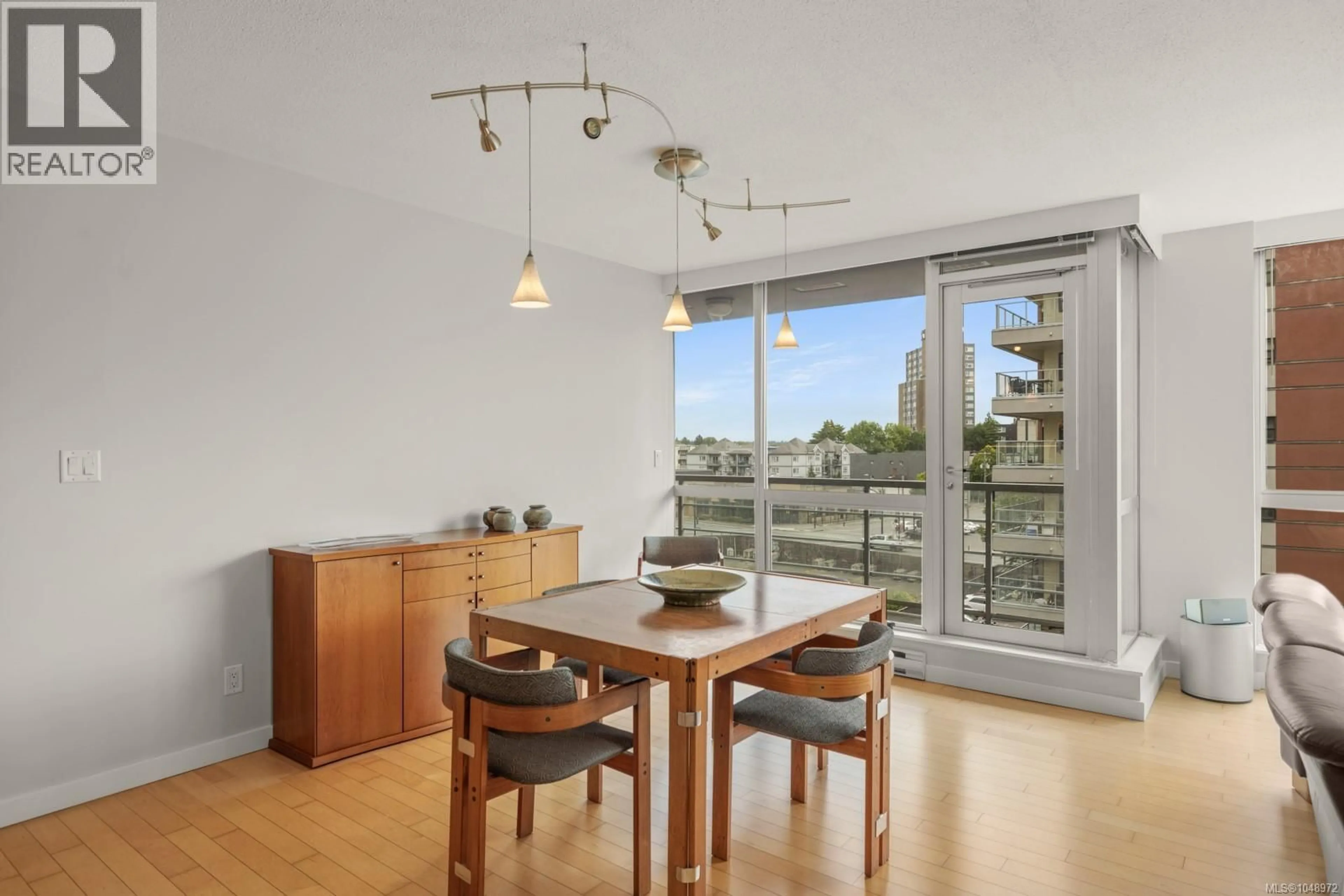 Dining room, wood/laminate floor for 605 - 732 CORMORANT STREET, Victoria British Columbia V8W1P8