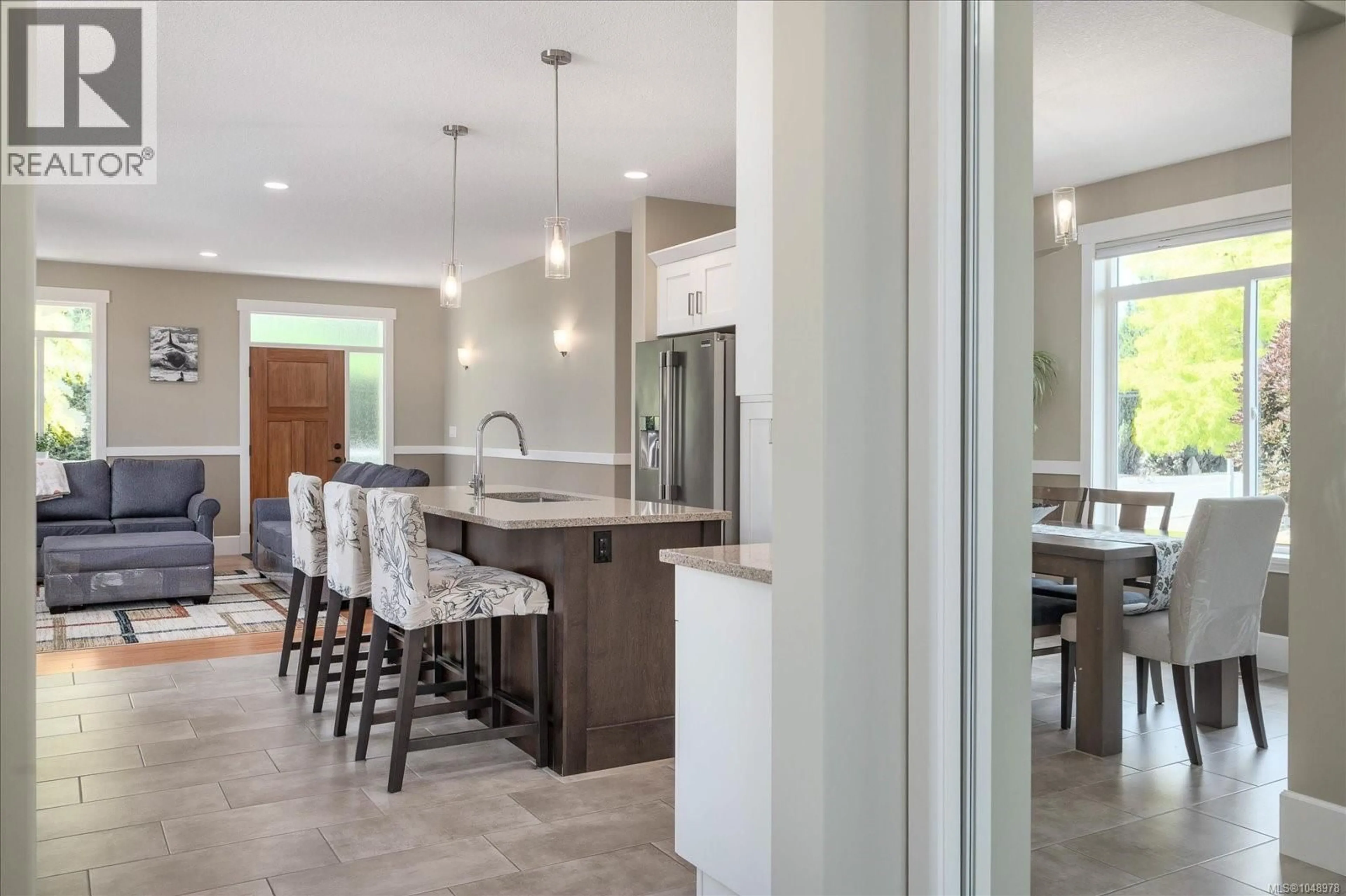 Open concept kitchen, ceramic/tile floor for 3827 JINGLE POT ROAD, Nanaimo British Columbia V9T5R1