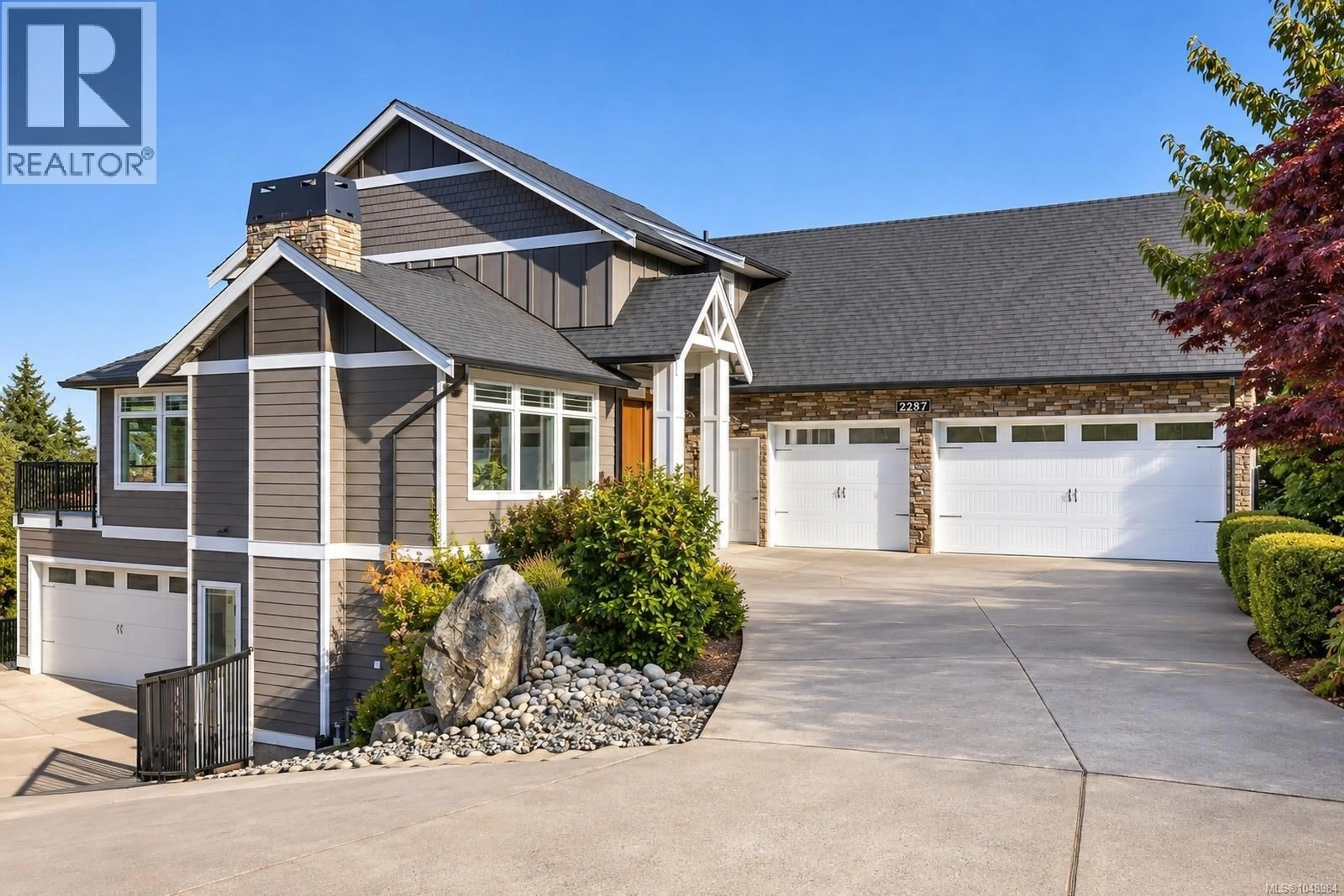 Home with vinyl exterior material, street for 2287 NICKLAUS DRIVE, Langford British Columbia V9B0L2