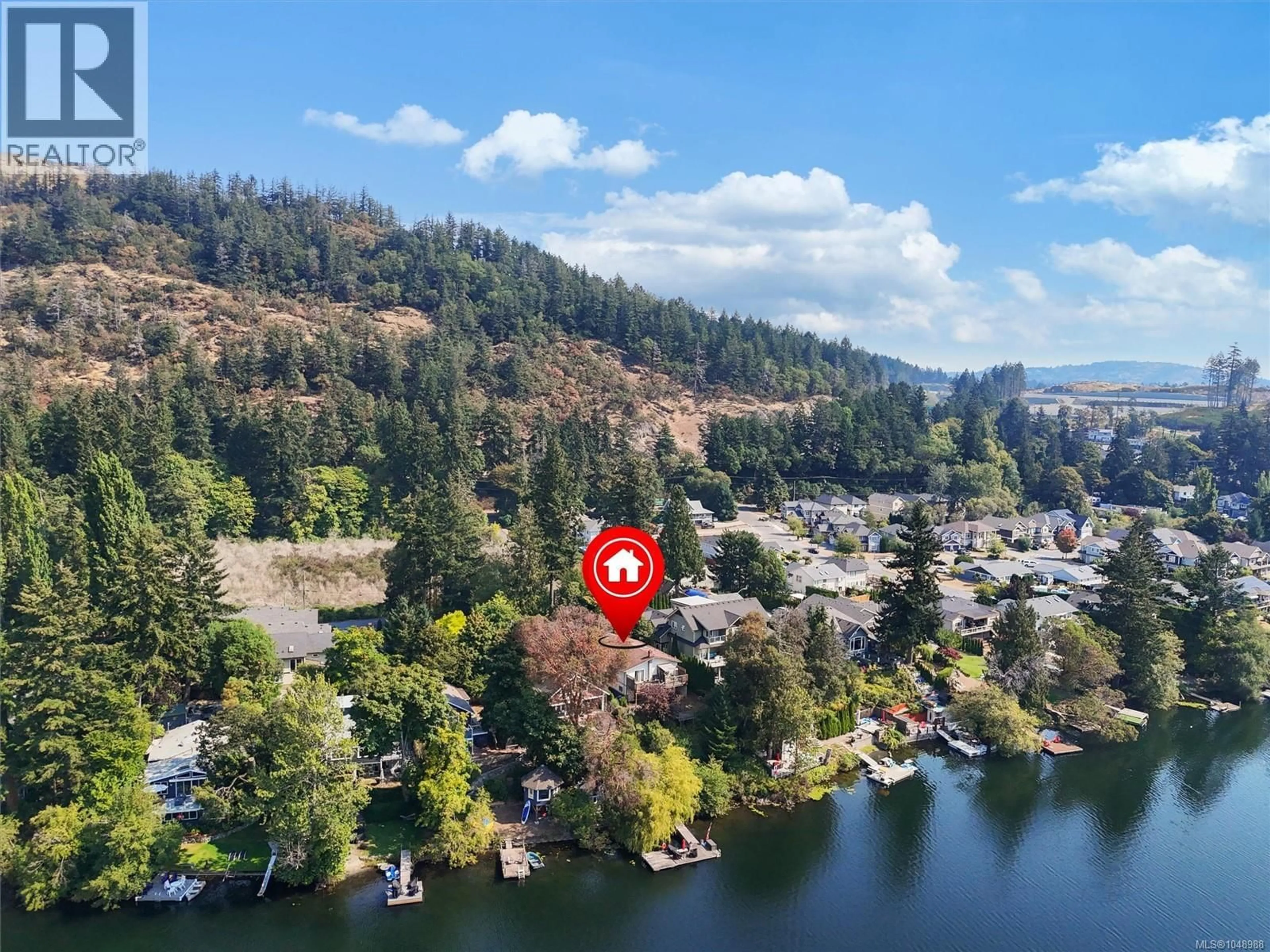 A pic from outside/outdoor area/front of a property/back of a property/a pic from drone, water/lake/river/ocean view for 2815 LAKE END ROAD, Langford British Columbia V9B2W2