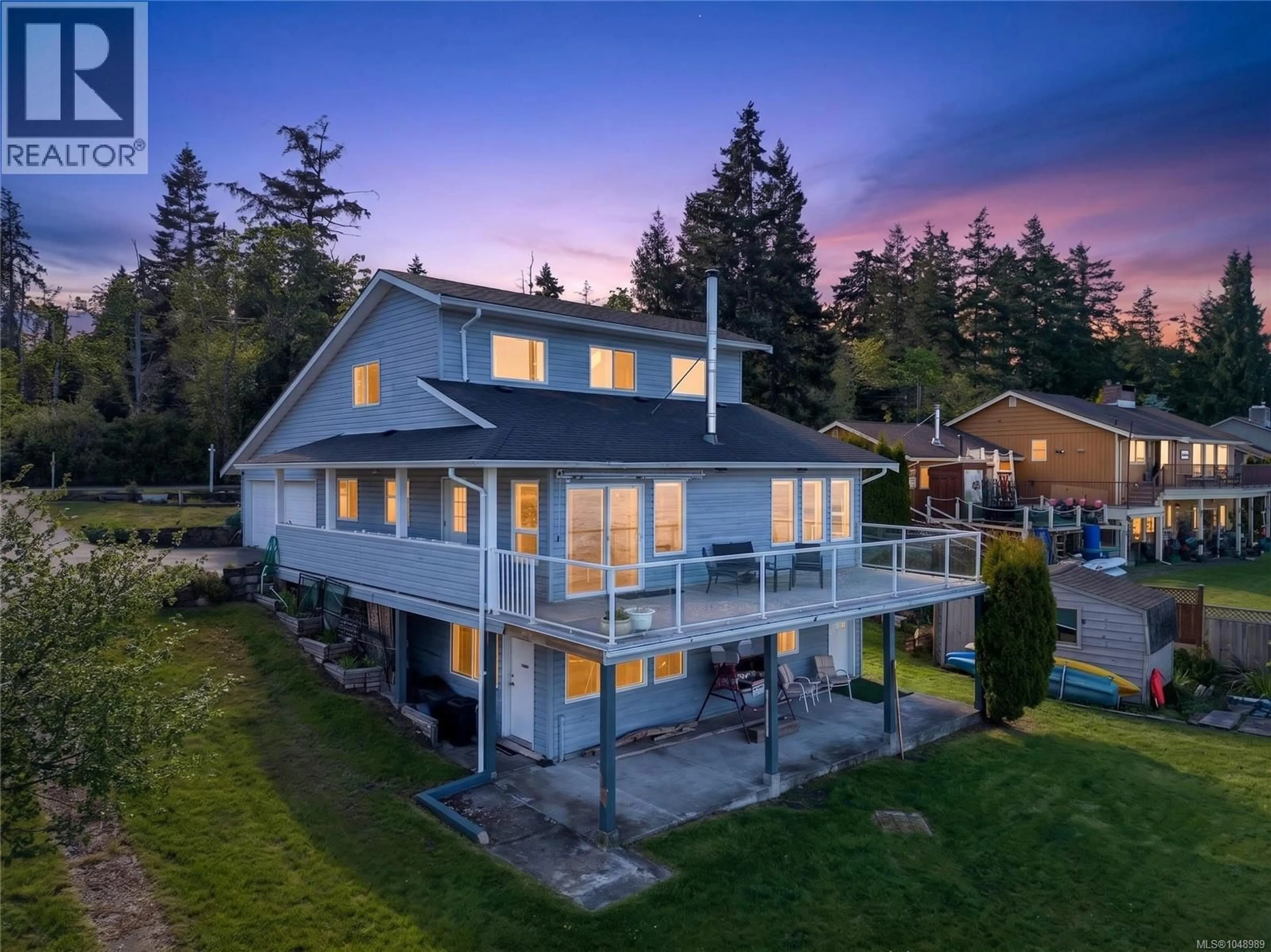 A pic from outside/outdoor area/front of a property/back of a property/a pic from drone, water/lake/river/ocean view for 6768 BUCKLEY BAY FRONTAGE ROAD WEST, Fanny Bay British Columbia V0R1W0