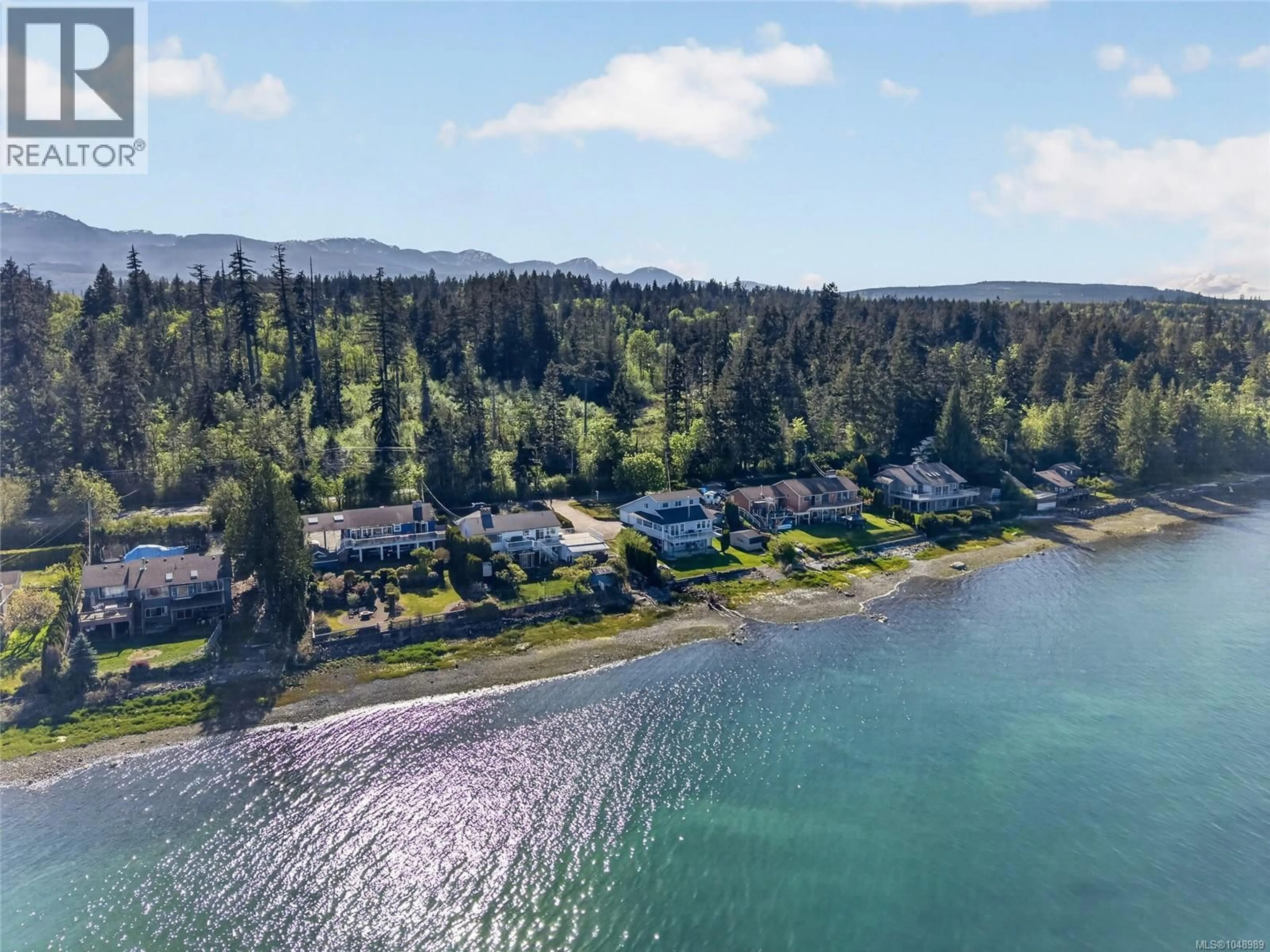 A pic from outside/outdoor area/front of a property/back of a property/a pic from drone, water/lake/river/ocean view for 6768 BUCKLEY BAY FRONTAGE ROAD WEST, Fanny Bay British Columbia V0R1W0