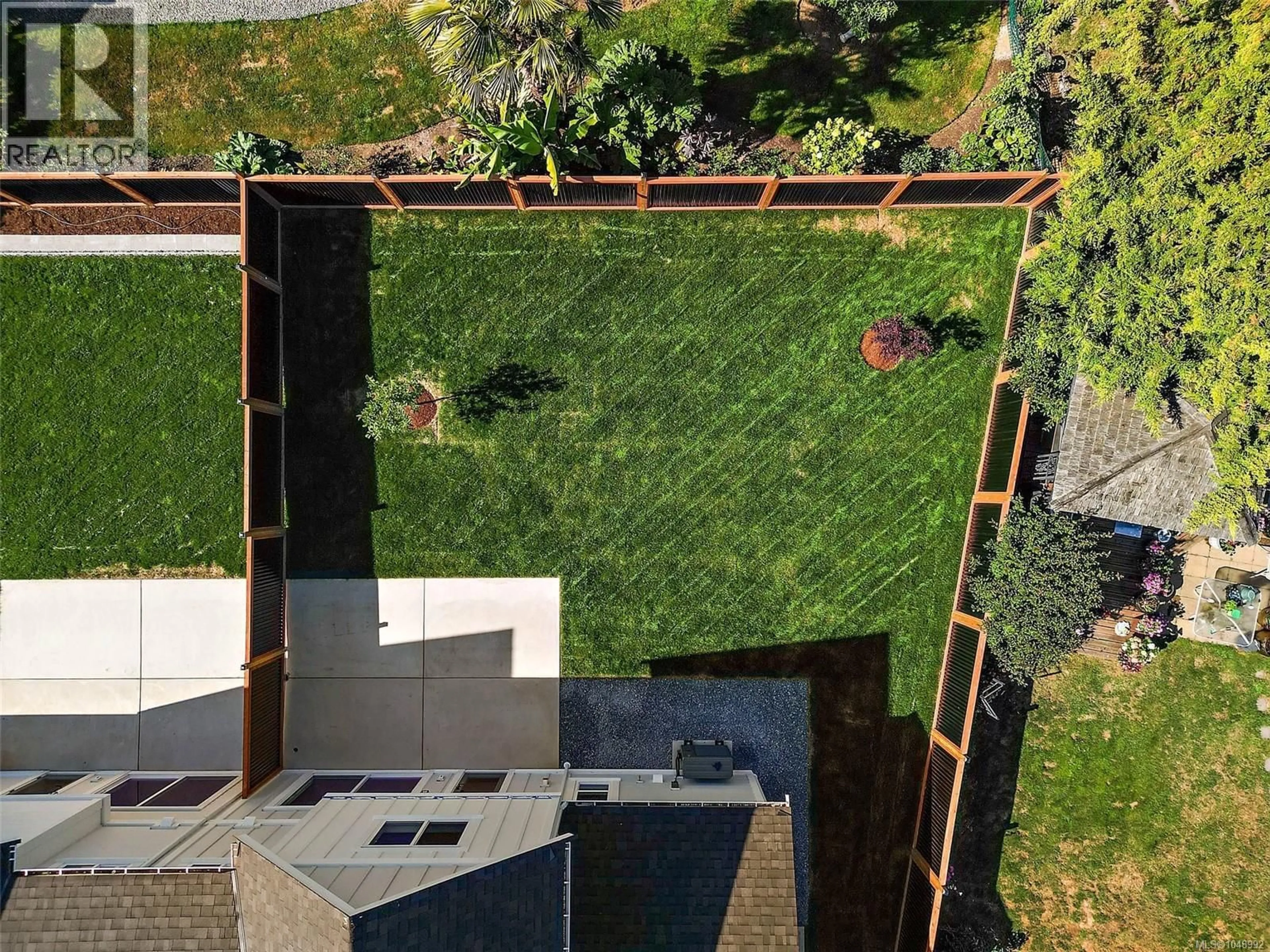 A pic from outside/outdoor area/front of a property/back of a property/a pic from drone, street for 102 - 1870 DONEY ROAD, Central Saanich British Columbia V8M1K6