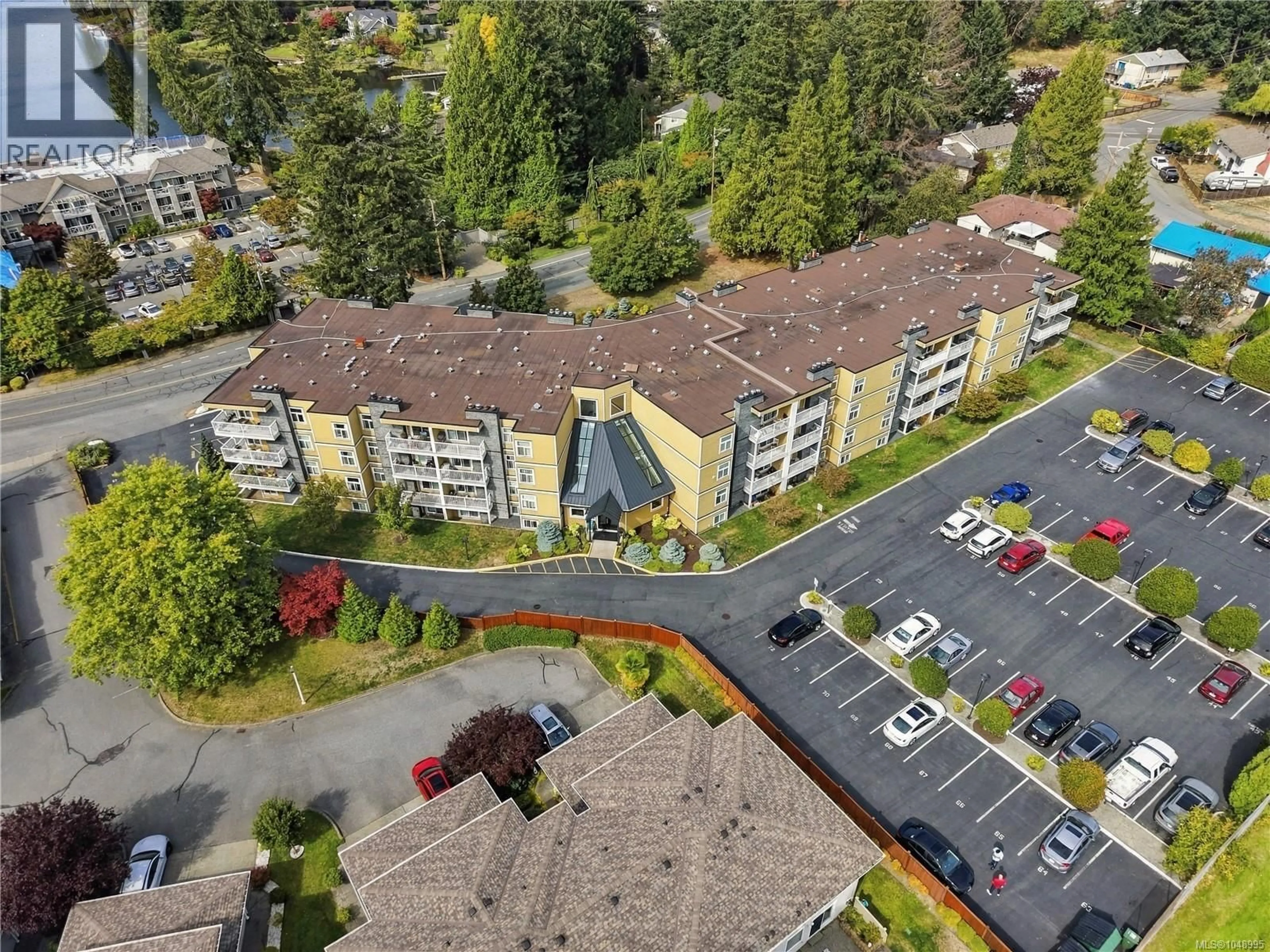 A pic from outside/outdoor area/front of a property/back of a property/a pic from drone, mountain view for 313 - 3270 ROSS ROAD, Nanaimo British Columbia V9T5J1