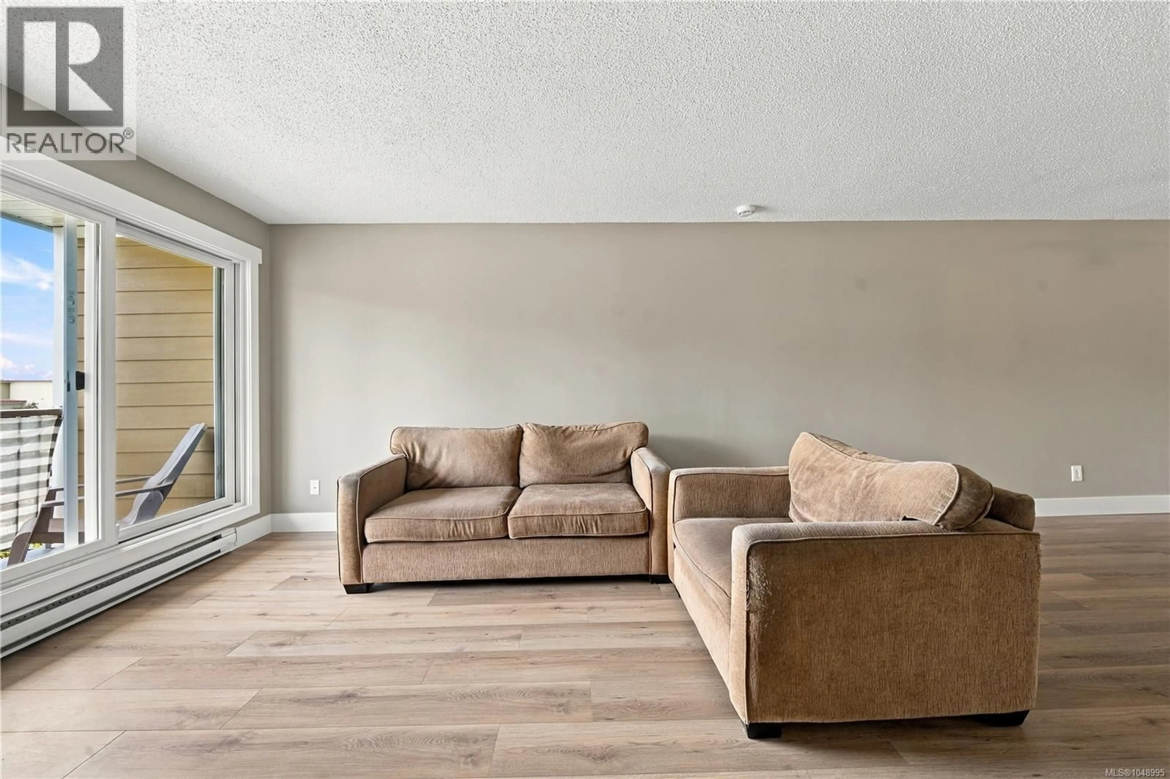 Living room with furniture, unknown for 313 - 3270 ROSS ROAD, Nanaimo British Columbia V9T5J1