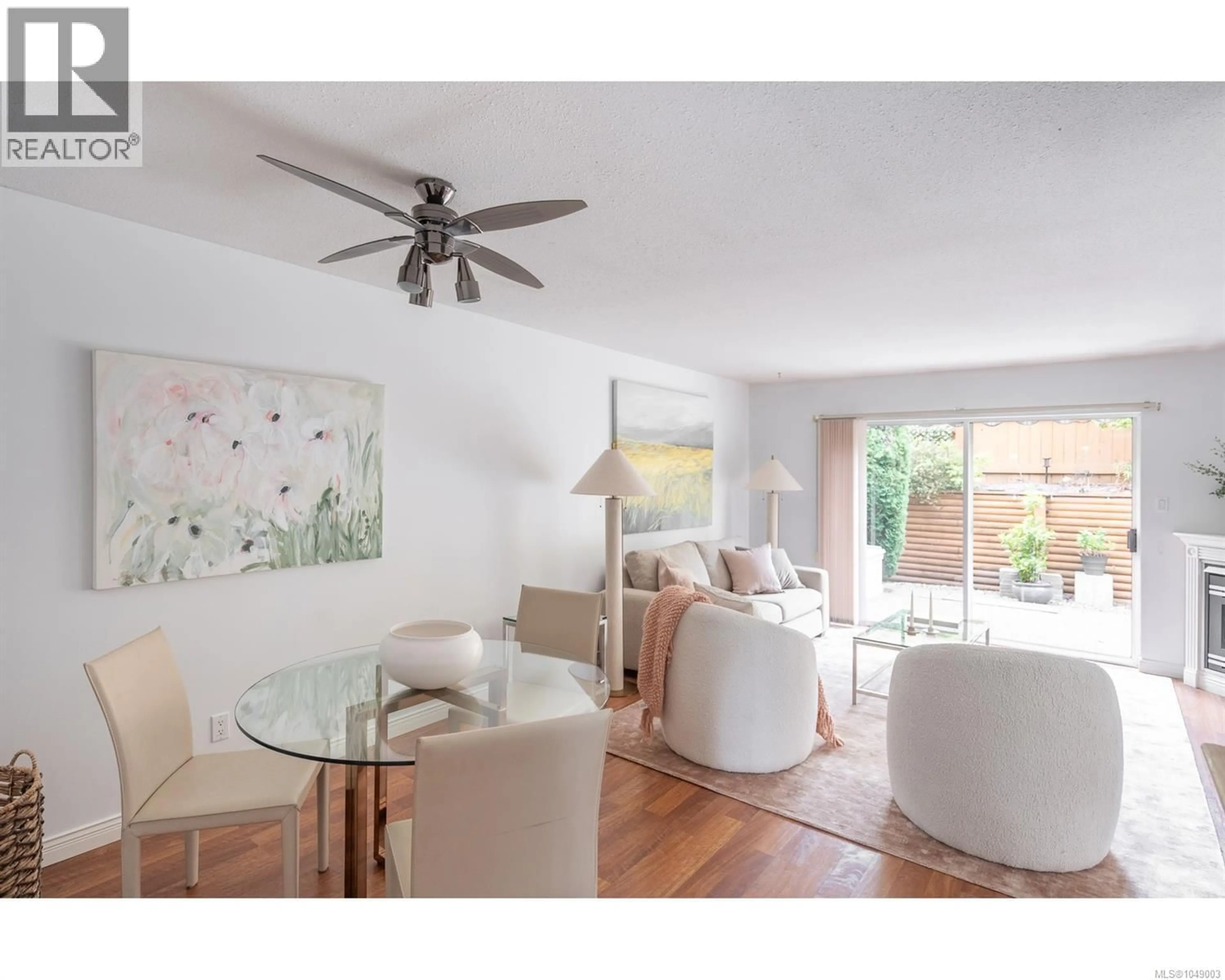 Living room with furniture, wood/laminate floor for 20 - 450 BAY AVENUE, Parksville British Columbia V9P2K2